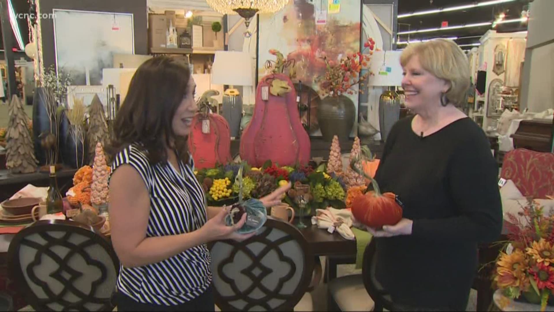 Nita Emory with BLACKLION shows us their wide selection of fall decorations.