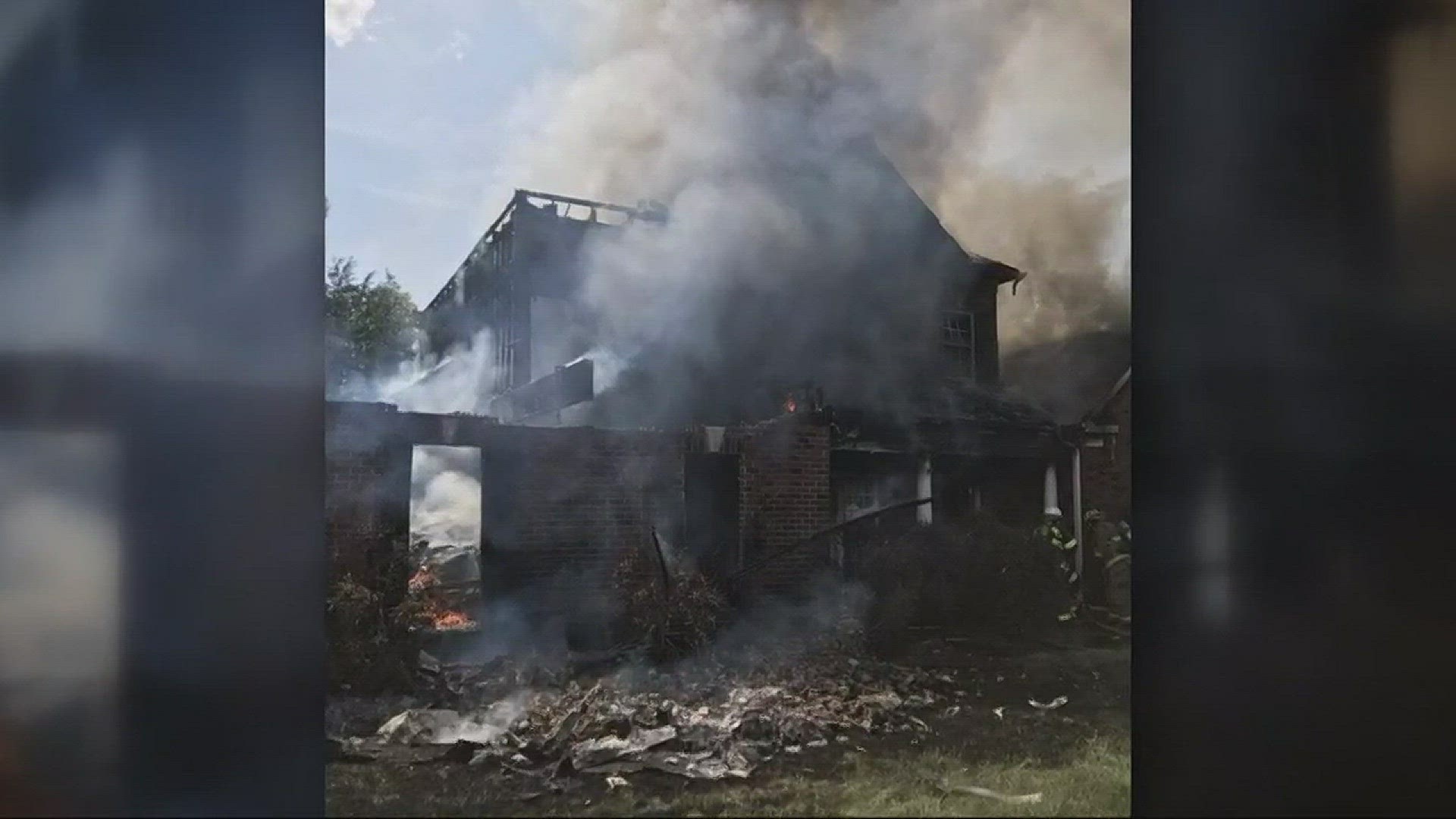 Multiple fire crews battled alongside an evening rainstorm to contain a multi-alarm fire that charred and destroyed a home in Harrisburg, North Carolina Wednesday night.