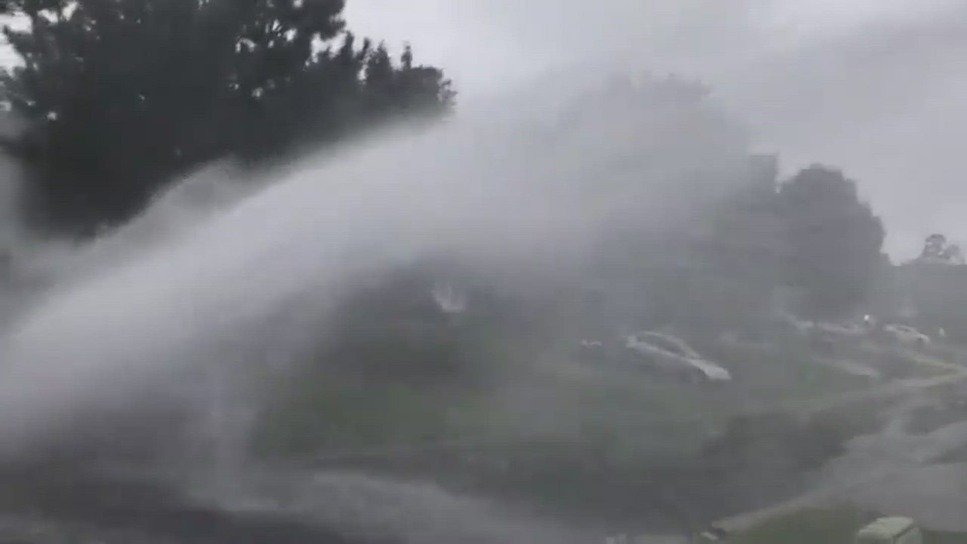 A powerful water main break in University City shot water 10 feet into the air, on top of the rainfall the area has already gotten from Florence. Video: Mike O'Hara
