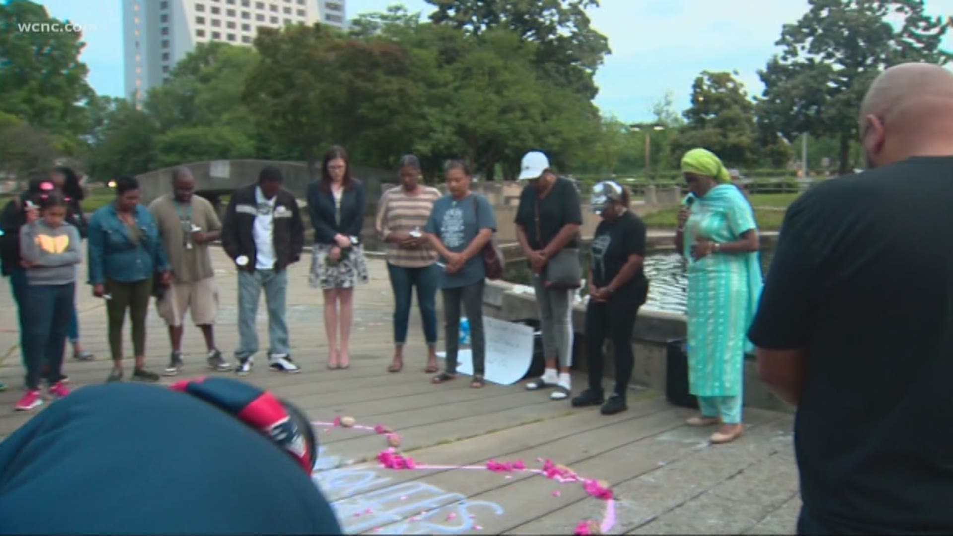 Franklin's family and others came together at Marshall Park to remember him at a prayer vigil one day after CMPD released the full body camera video of that deadly shooting.