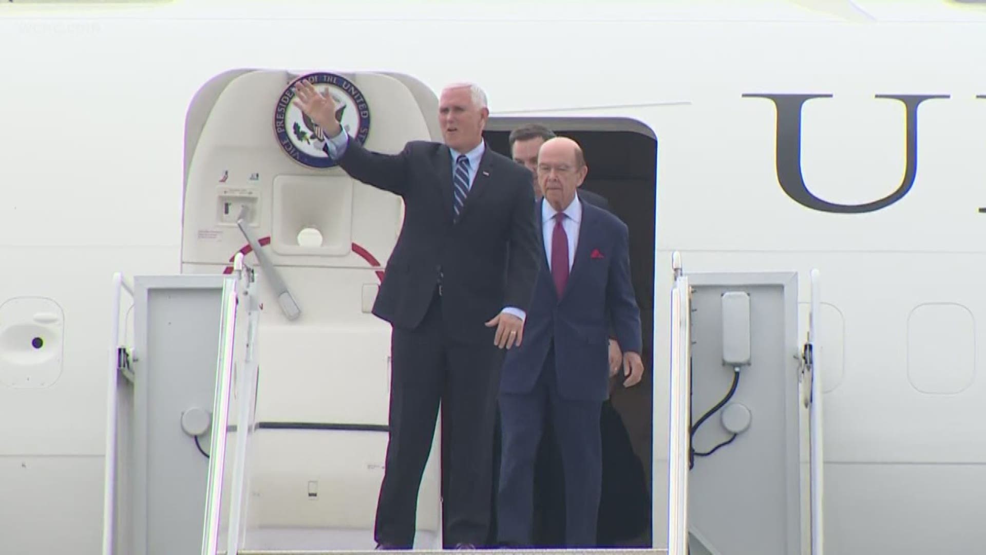 Vice President Mike Pence was greeted by a group of supporters after landing in Charlotte Wednesday. He is scheduled to speak at two events in the area before wrapping up his North Carolina visit in Greensboro.