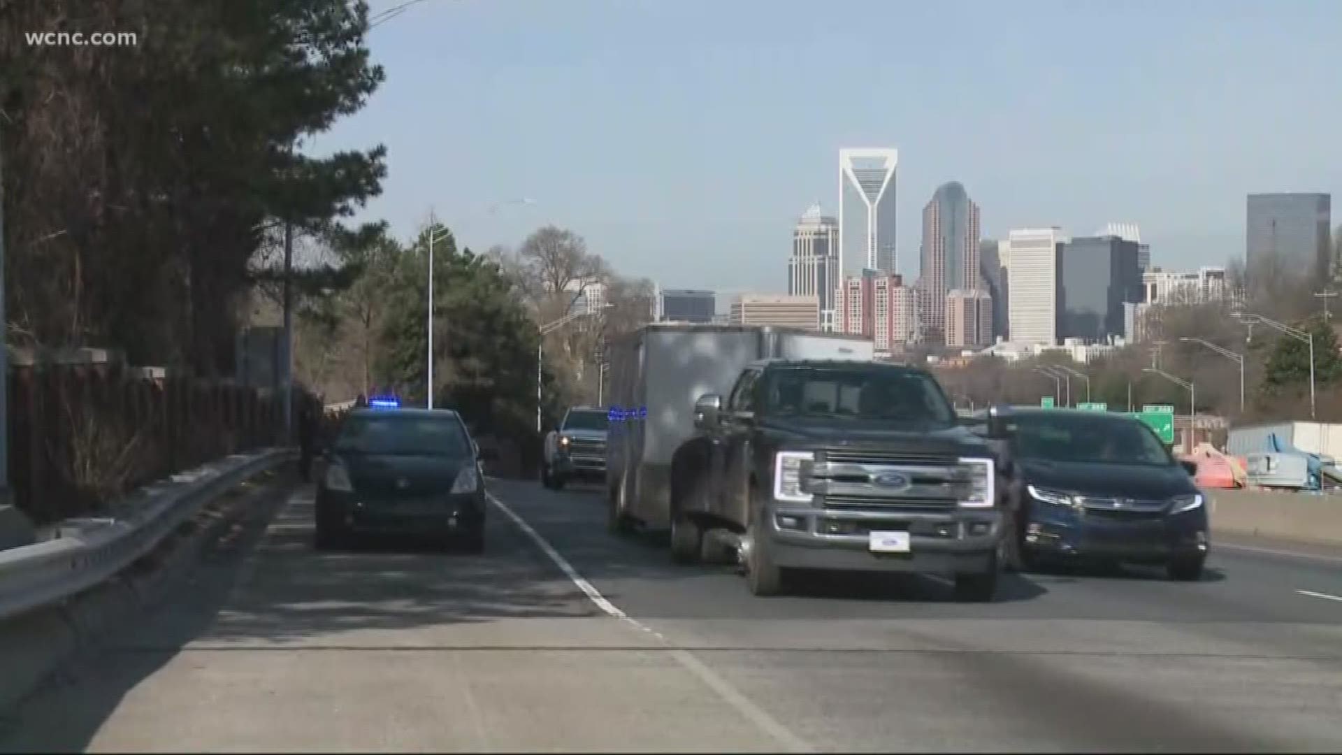 Police said shots were fired into a car traveling outbound on Independence Boulevard just before 10 a.m. Wednesday.