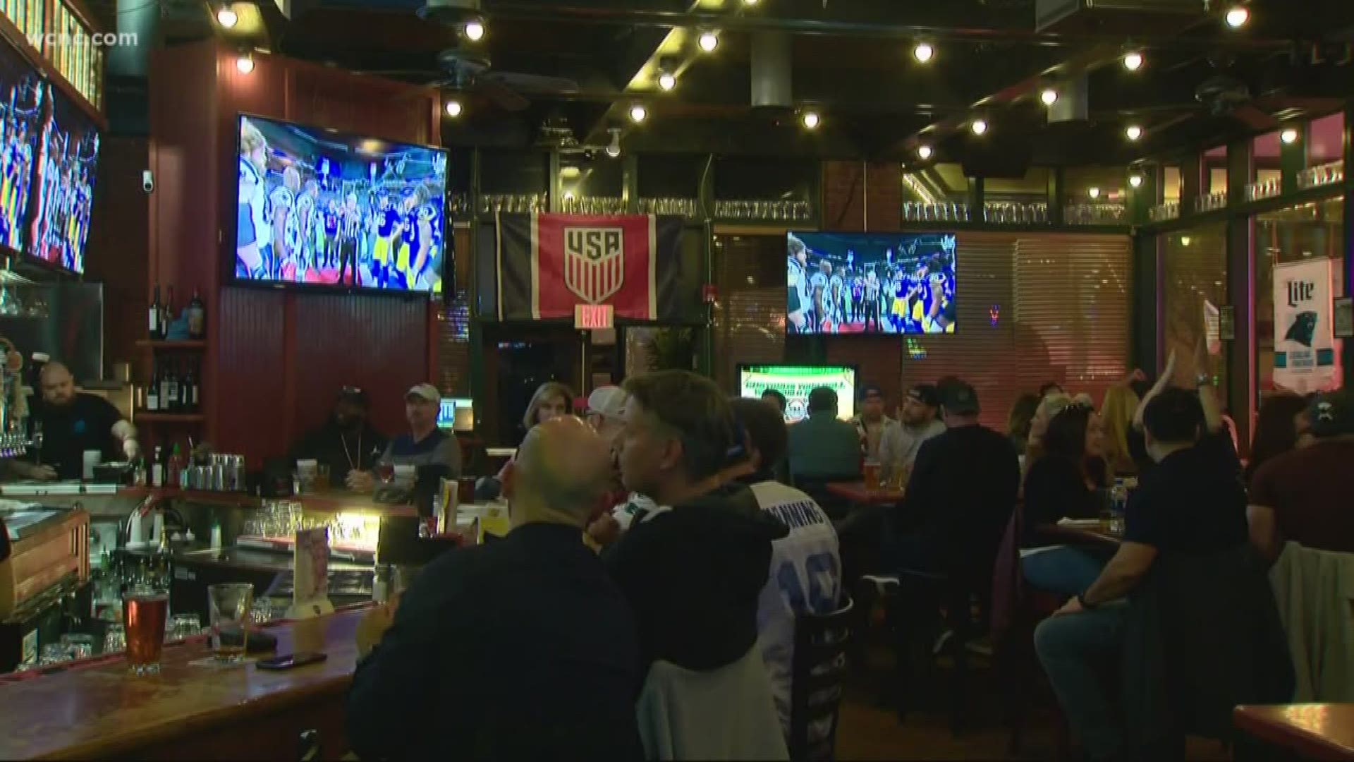 Football fans across the Queen City crowded into bars and restaurants to watch the big game -- even though the Panthers didn't make the cut this year.