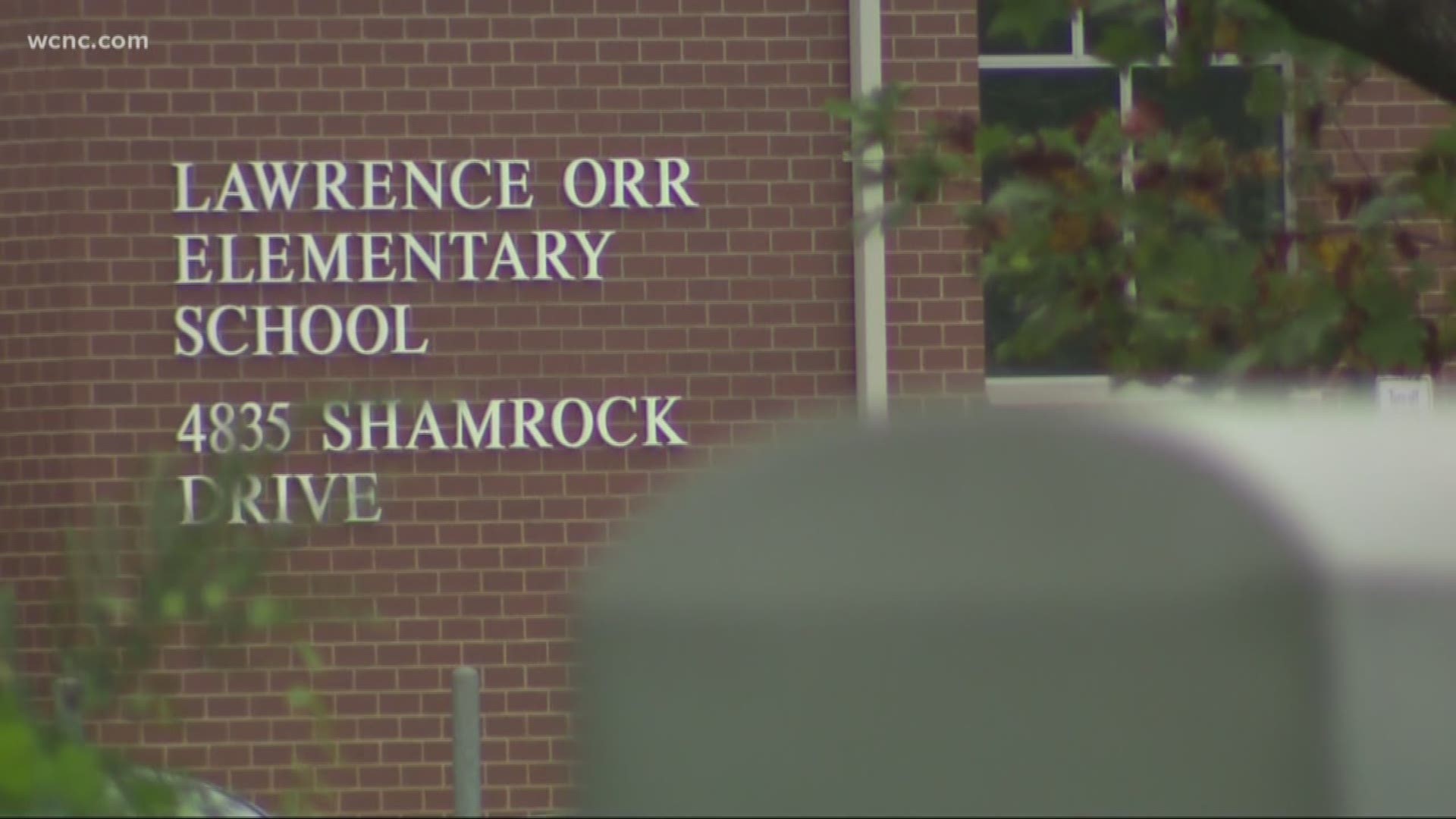 Police are searching for a suspect who opened fire in the drop off line at Lawrence Orr Elementary in northeast Charlotte.