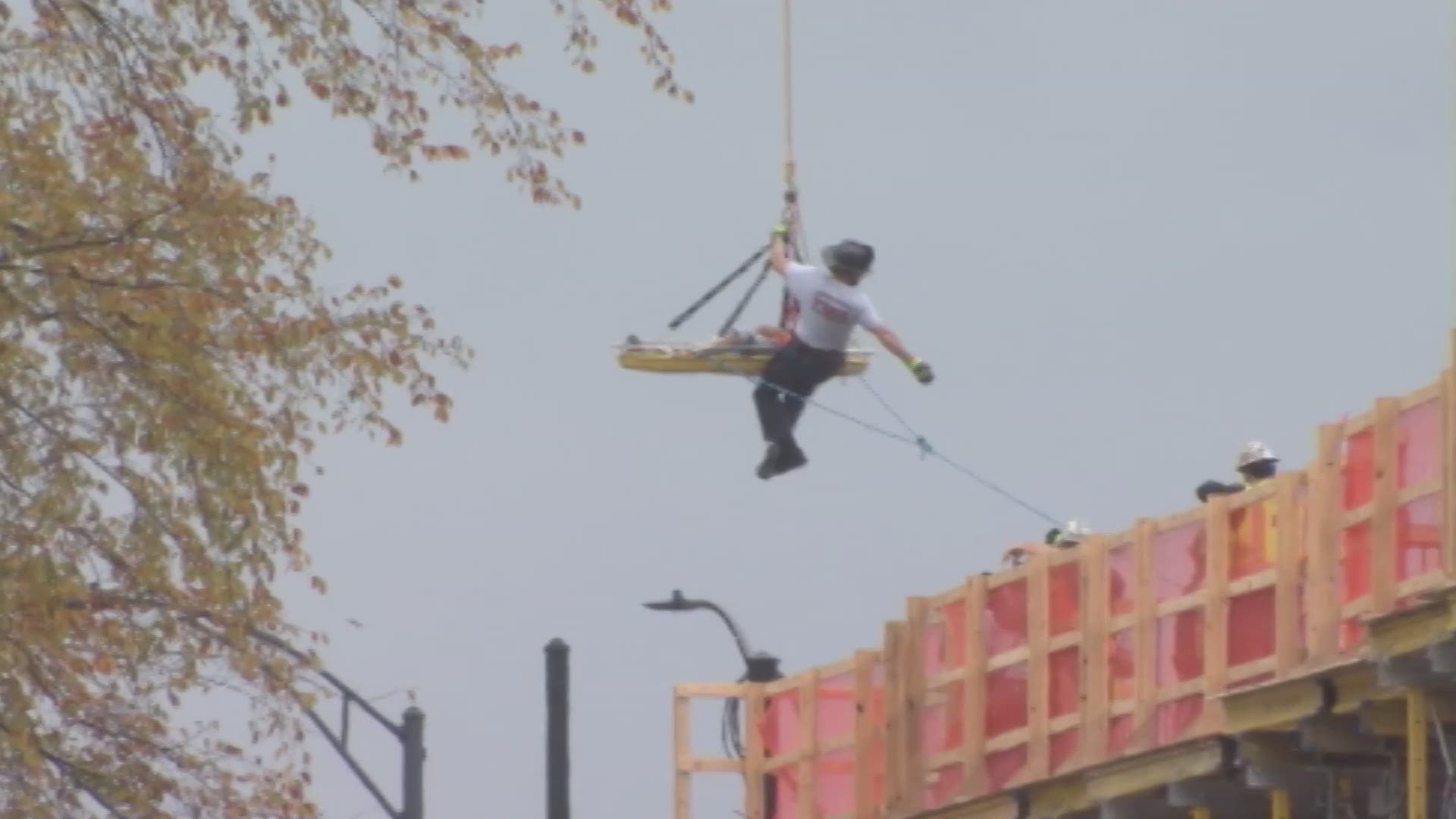 Rescuers used a construction crane in uptown Charlotte to rescue an injured worker from an high rise construction site Tuesday.