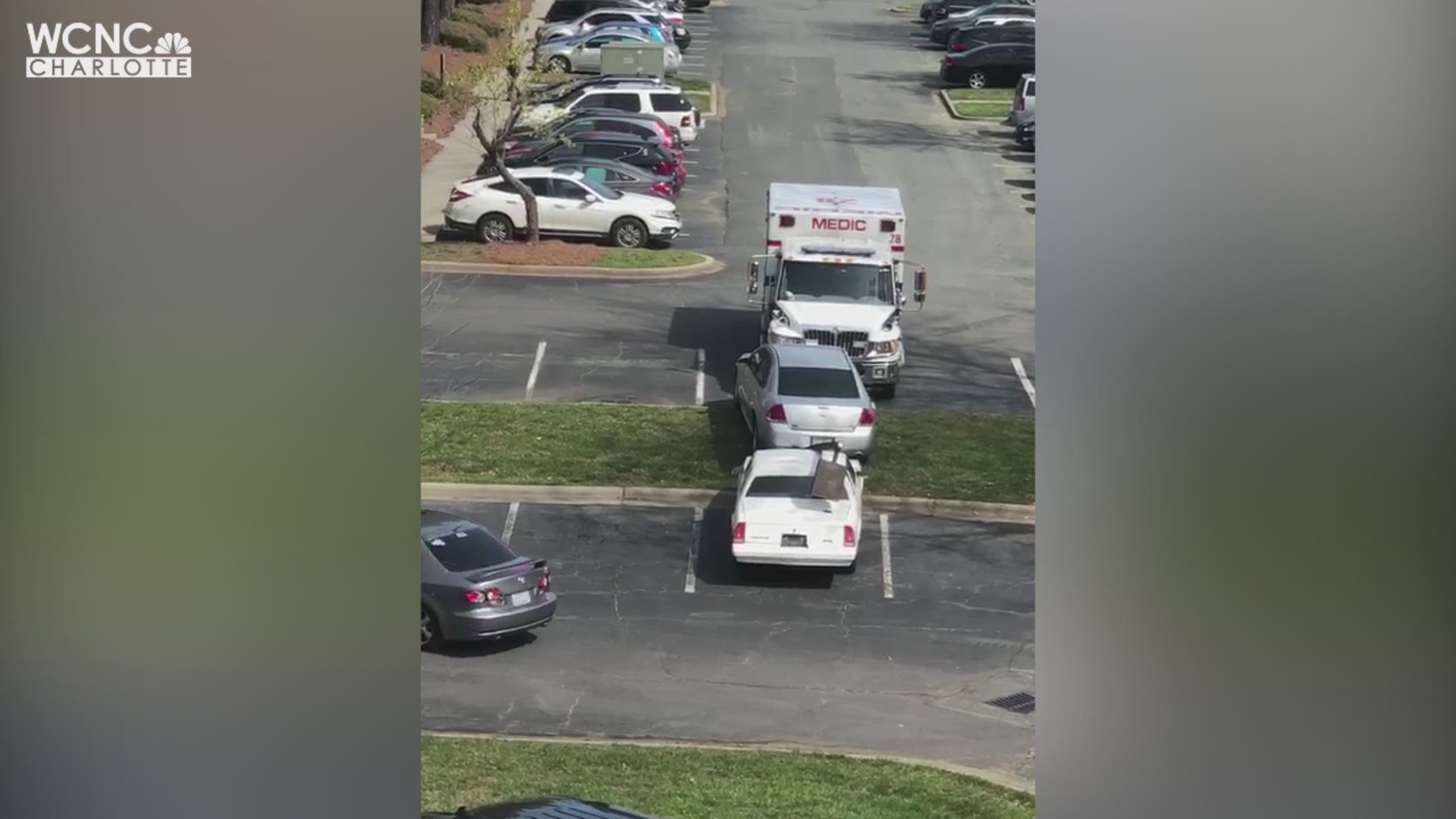 In the video, you can see the ambulance lunge forward and push two cars into other vehicles in a parking lot in east Charlotte.