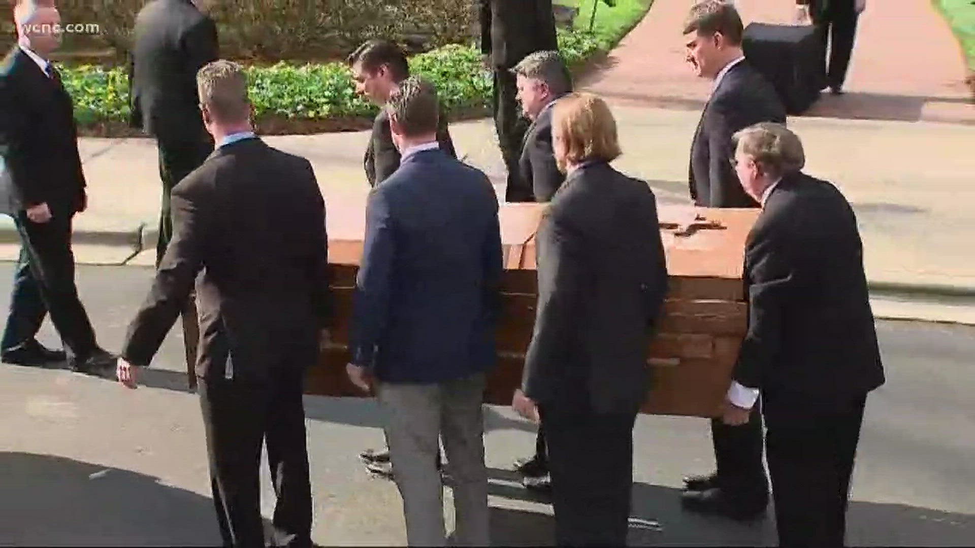 Family and friends were at the Billy Graham Library to watch as the hearse arrived after a three-hour motorcade down from the mountains he loved so much.