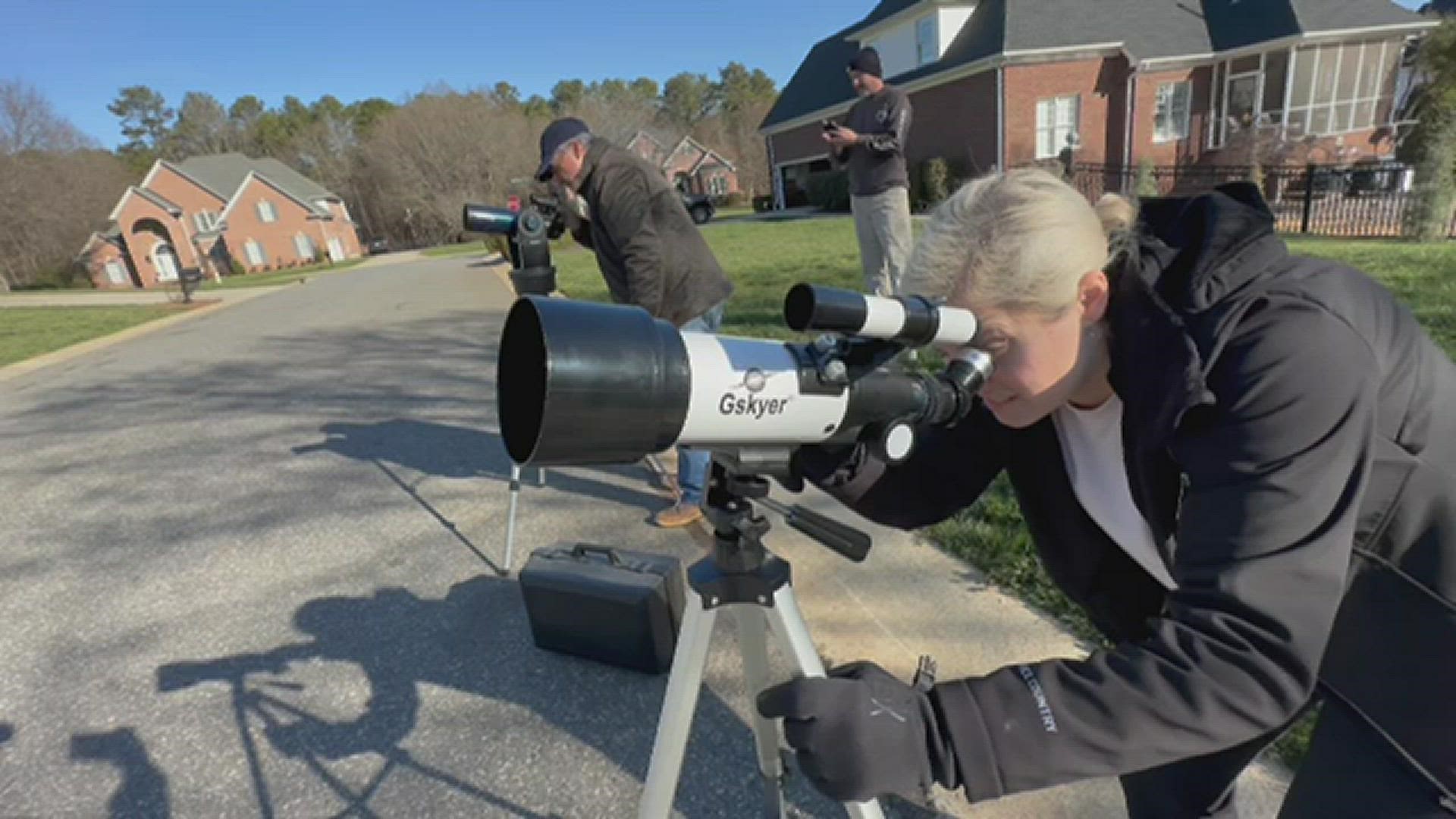Spotters in Belmont, NC, a western suburb of Charlotte, track what is believed to be a Chinese surveillance balloon in the sky Saturday morning.