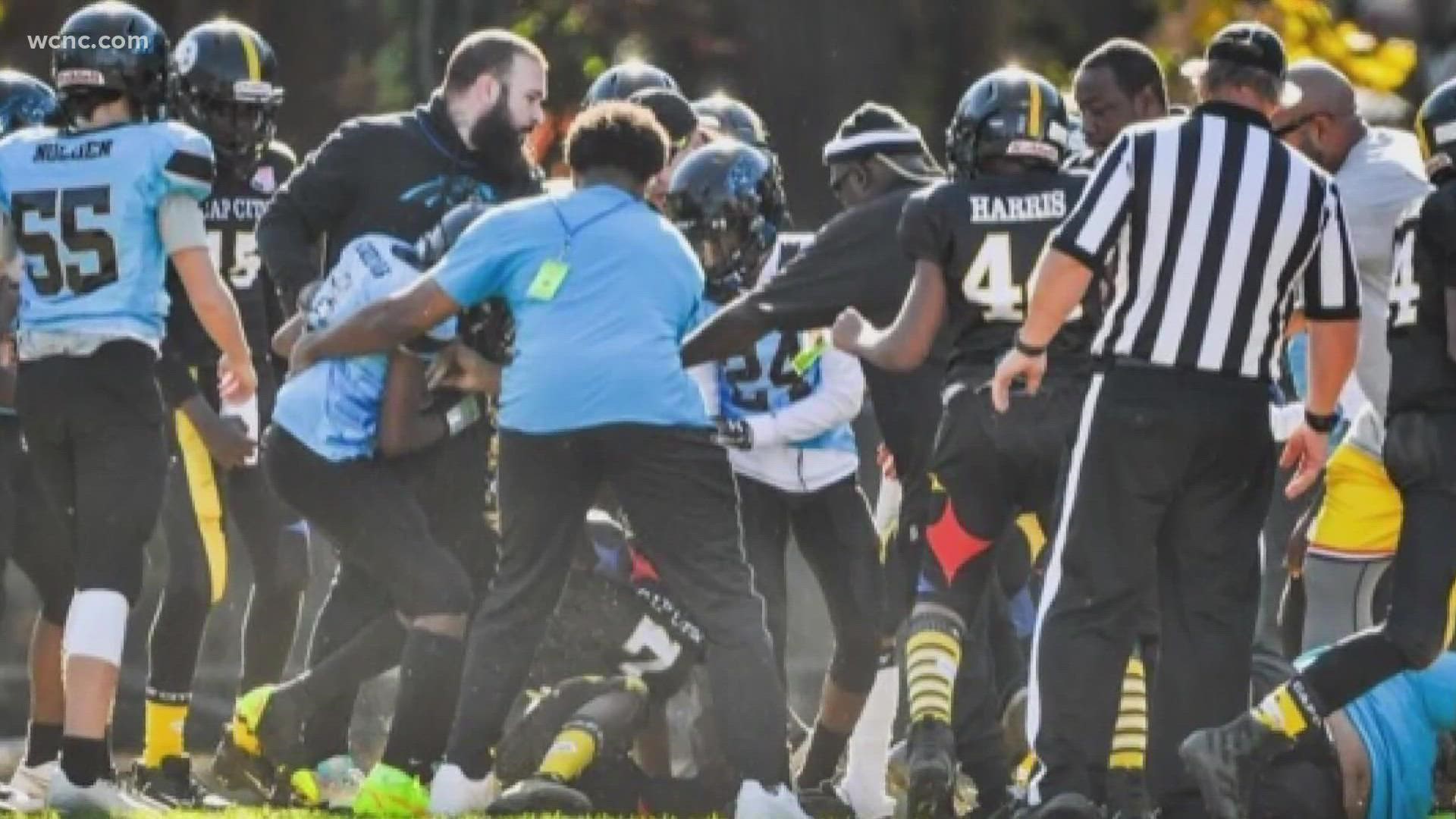 Fans recorded the brawl on their cell phones during a Pop Warner playoff game in Cary last Saturday.