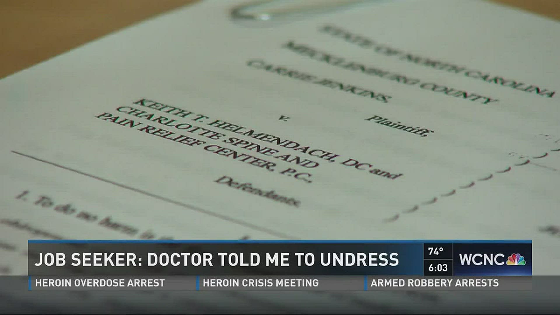 A woman is suing a Mint Hill chiropractor, claiming he told her to undress during a job interview in 2014.