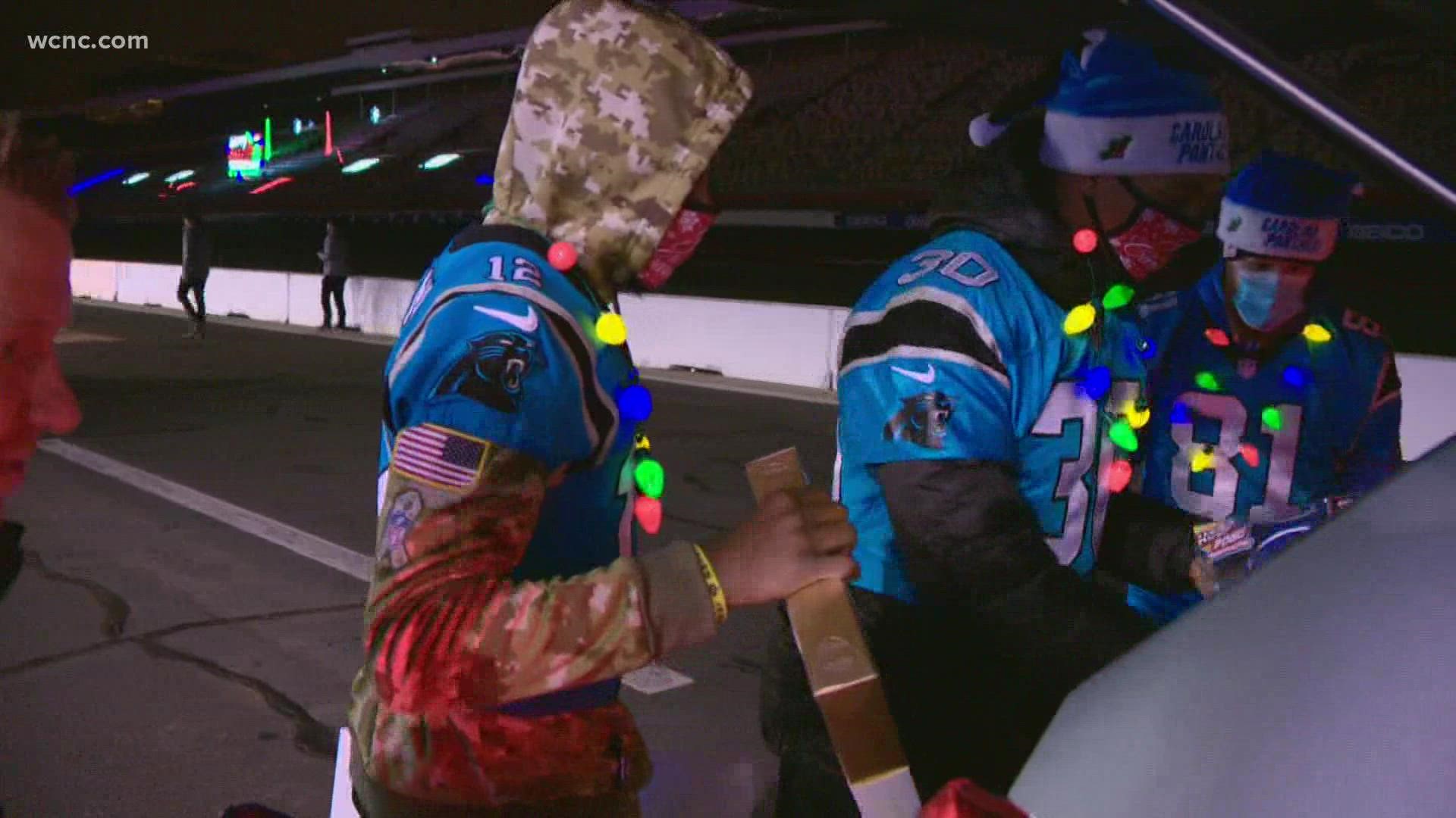 Carolina Panthers players were there to load up cars for families in need.