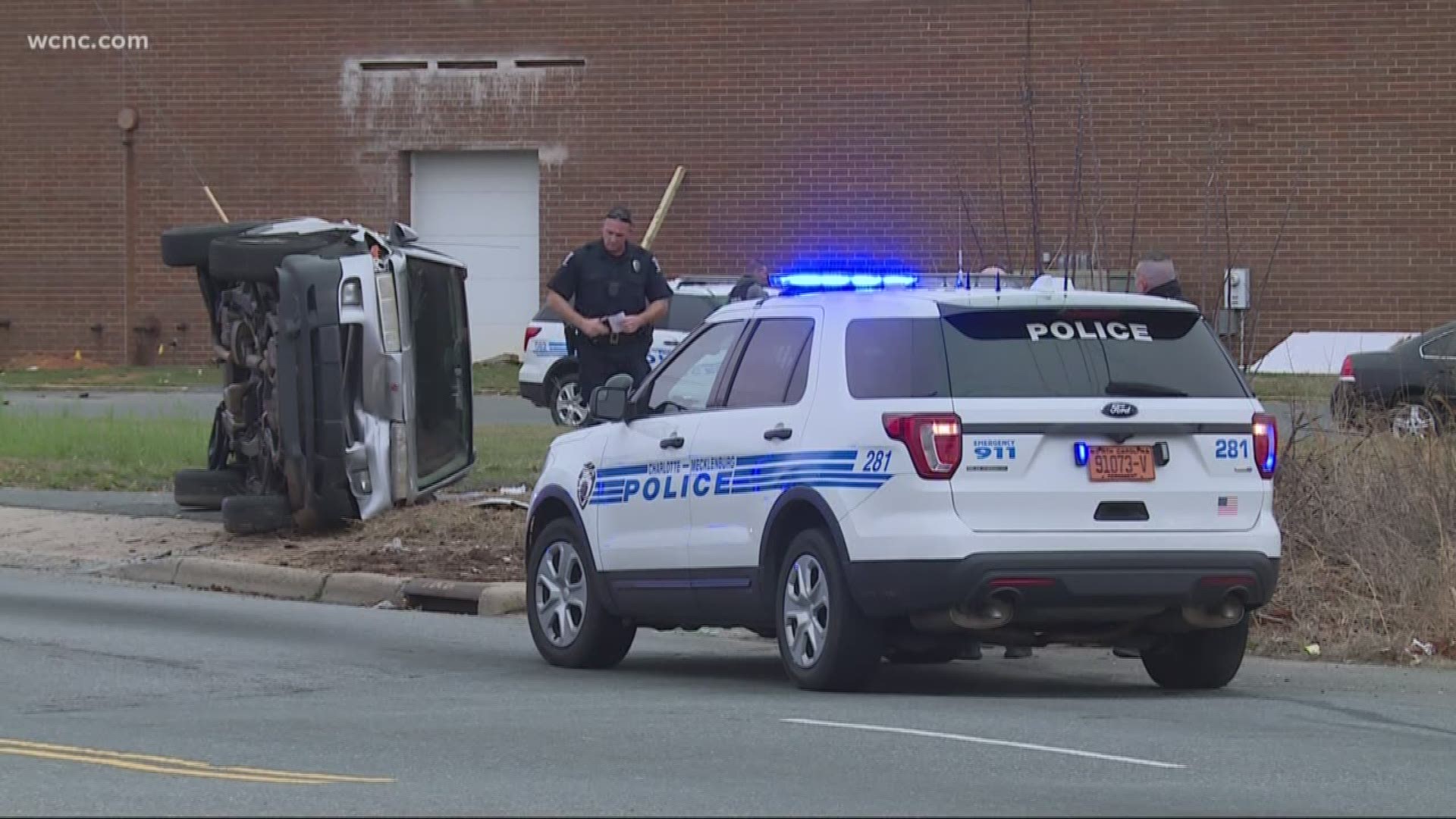 A man was taken into custody after police said he followed a woman to an east Charlotte police station after a domestic dispute.