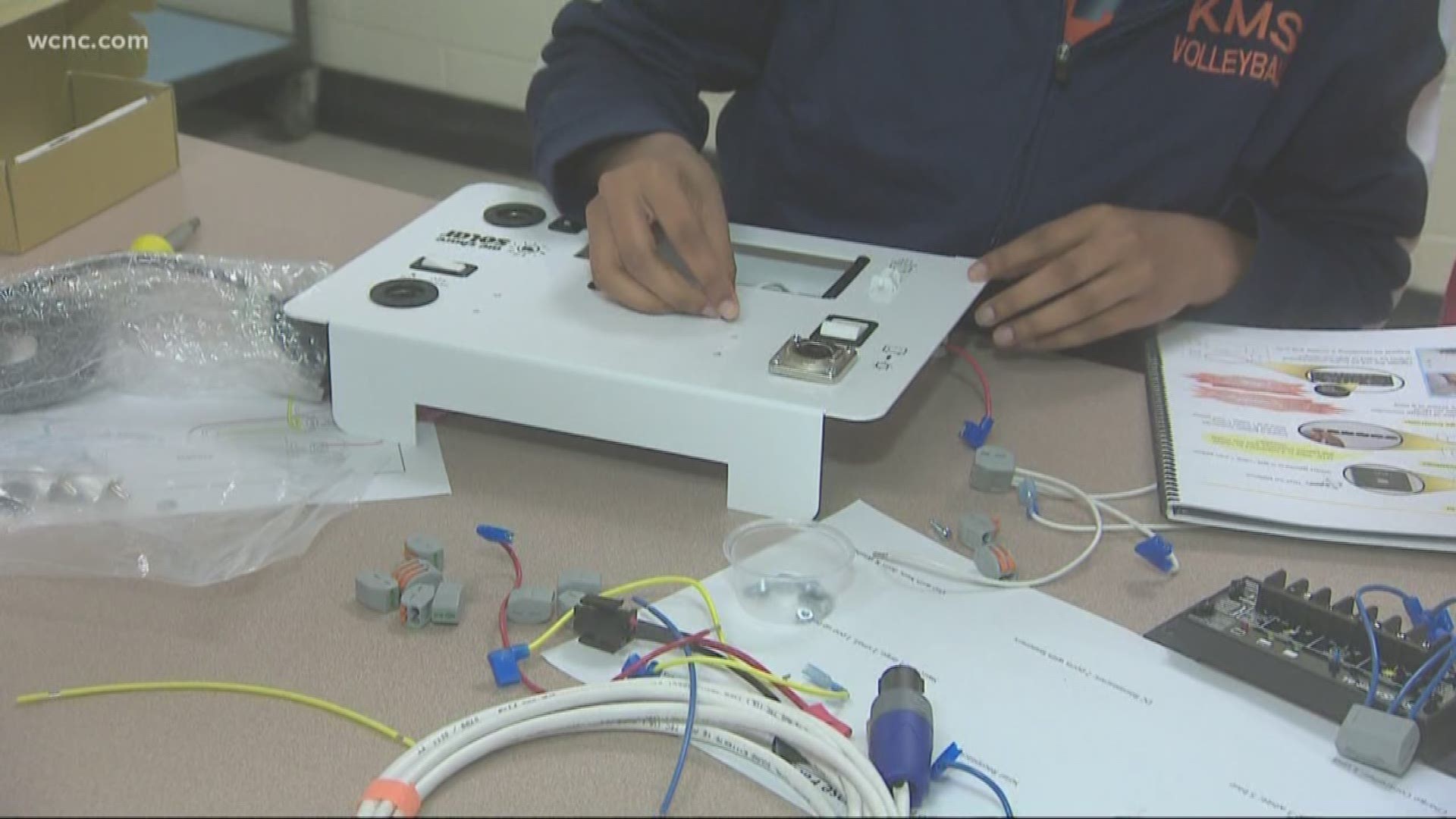 Kids at Kennedy Middle School made solar suitcases to be used in medical clinics in Africa.