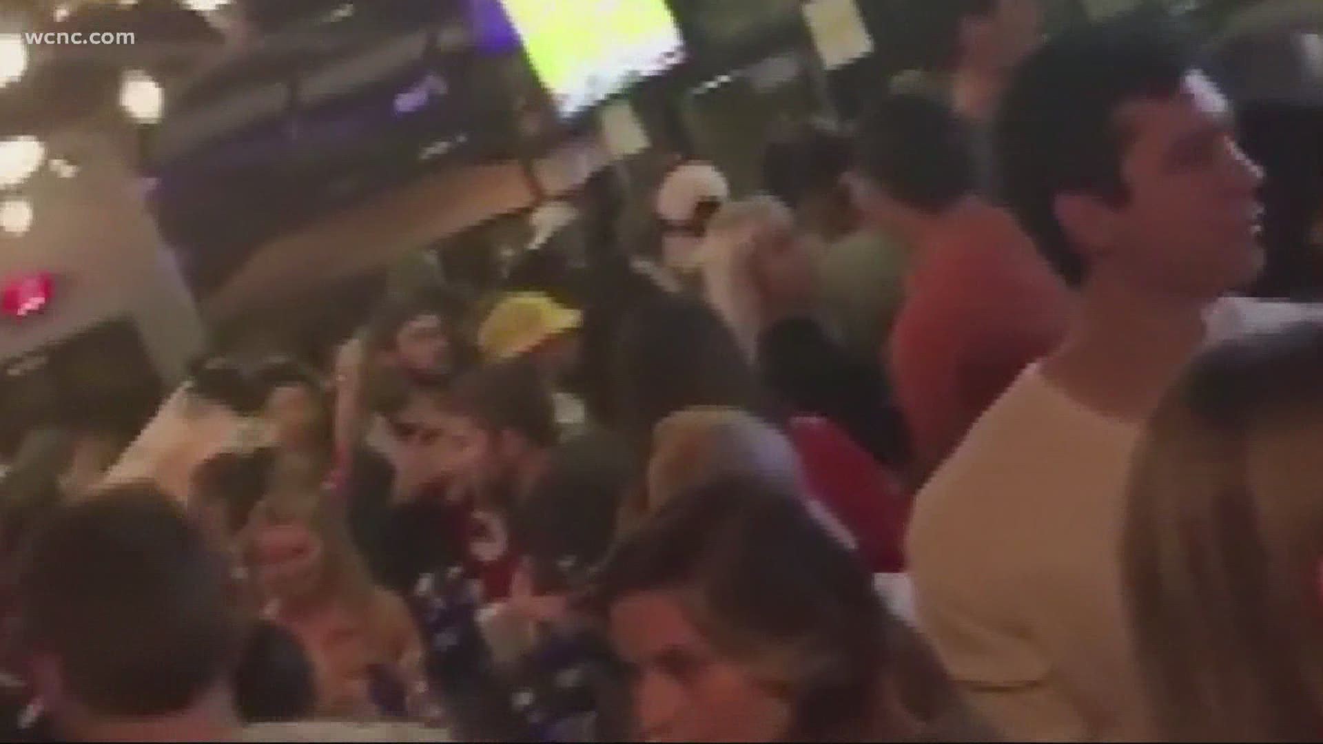 Video shows plenty of people with little to no social distancing at a bar in the Charlotte area. CMPD says arcades, hookah lounges and bars are all on their radar.