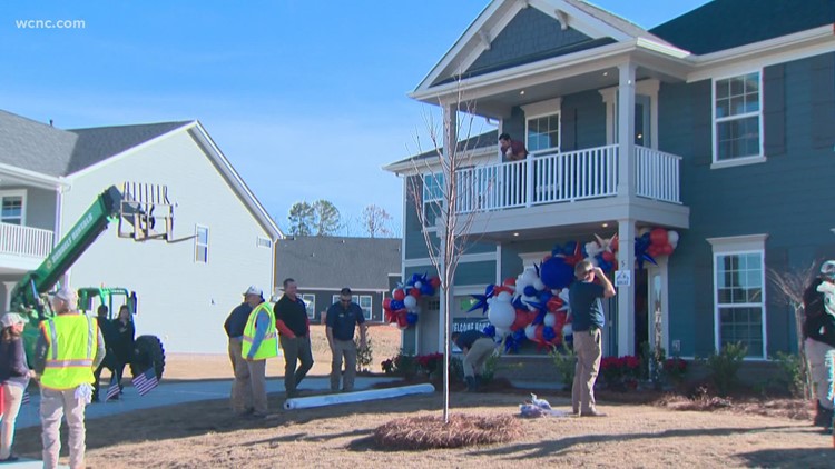 New home given to wounded veteran and his family