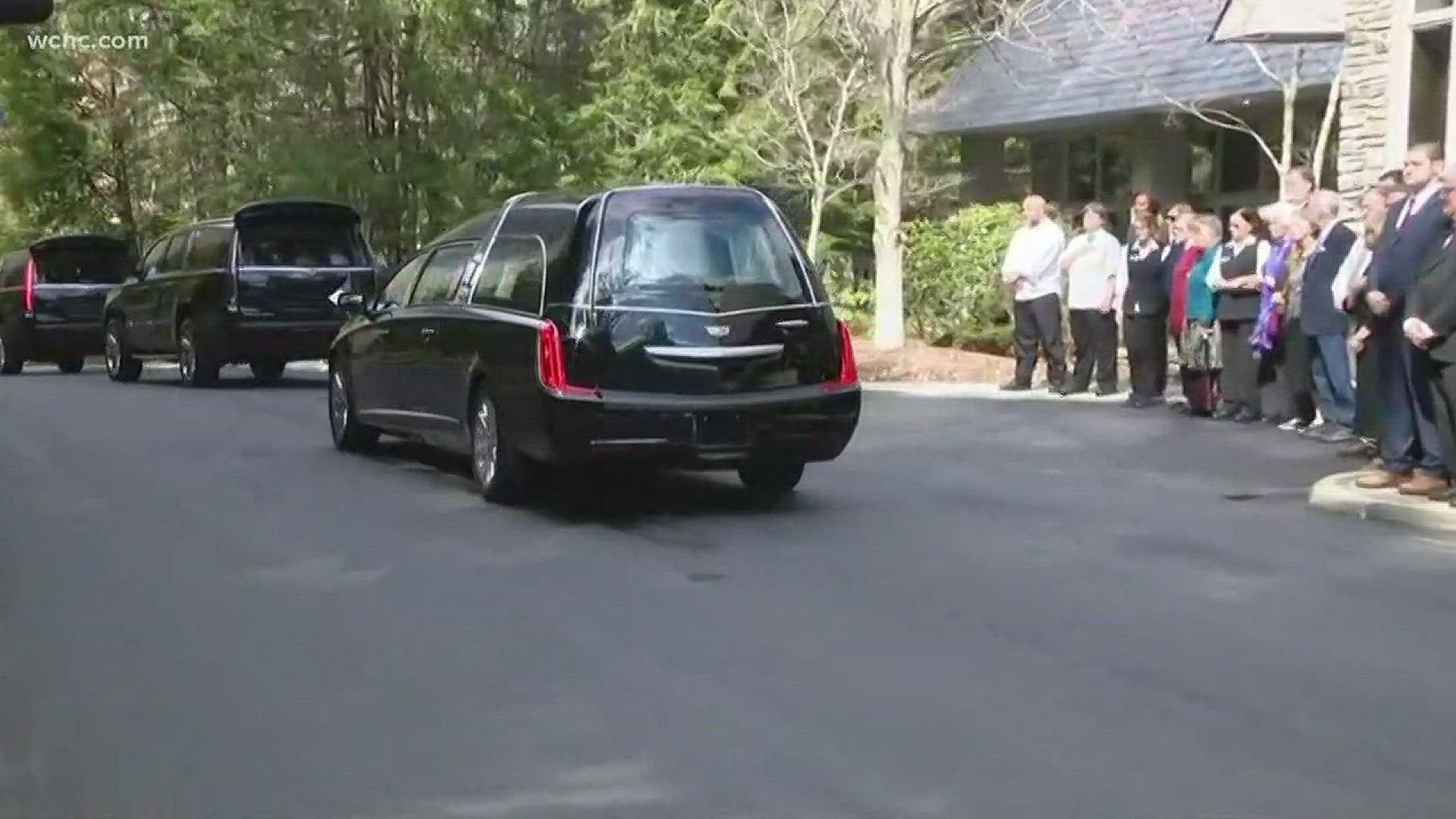 The casket of Rev. Billy Graham exits The Cove in Montreat, en route to the Billy Graham Library in Charlotte.