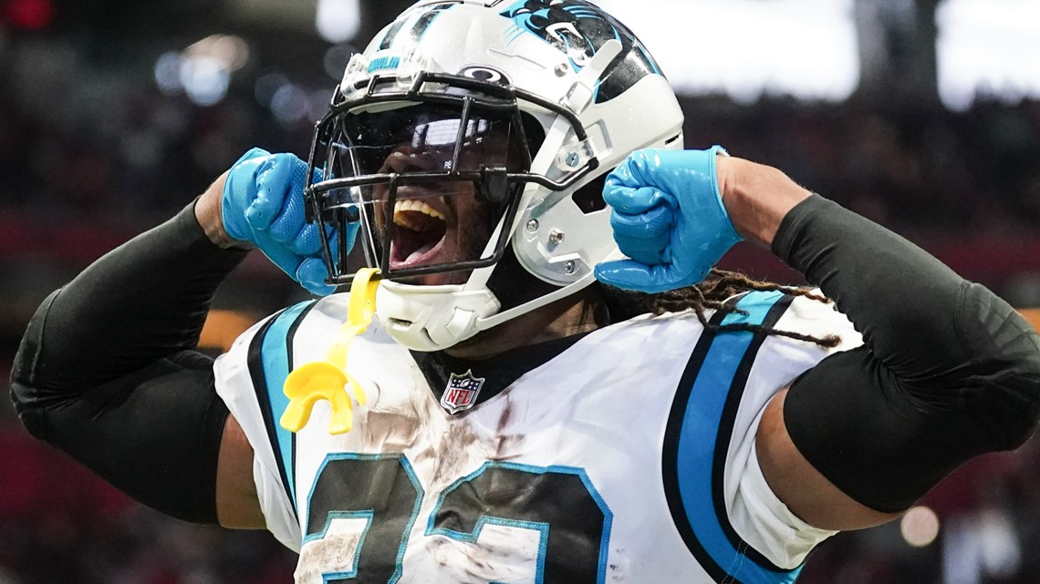 Carolina Panthers running back Chuba Hubbard runs against the Atlanta  Falcons during the first half of an NFL football game on Thursday, Nov. 10,  2022, in Charlotte, N.C. (AP Photo/Rusty Jones Stock