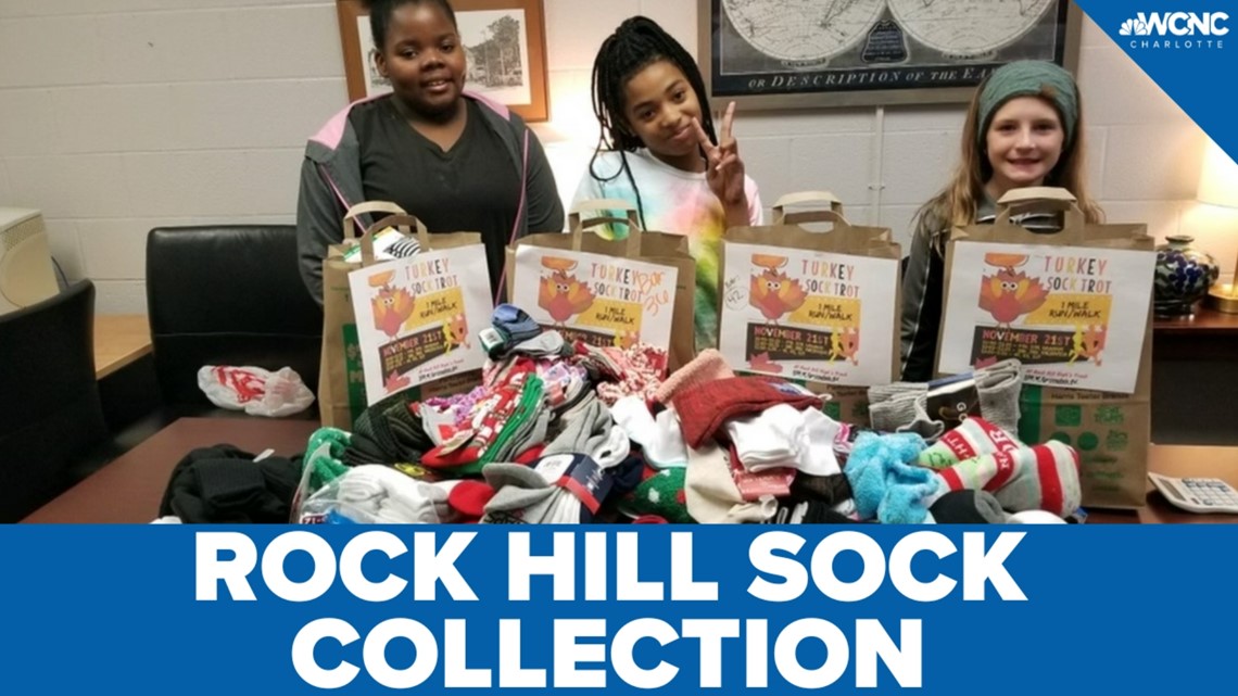 Elementary school students collect socks to donate to those in need