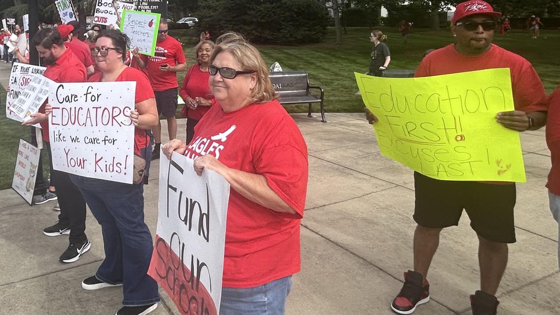 Hundreds rallied in Dallas for higher teacher pay, highlighting financial challenges in education. Ex-librarian Laverne Cordeiro's layoff underscores the issue.