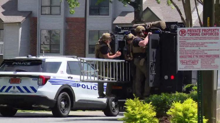 CMPD's SWAT team responds to barricaded suspect situation in east Charlotte neighborhood; public advised to avoid area.