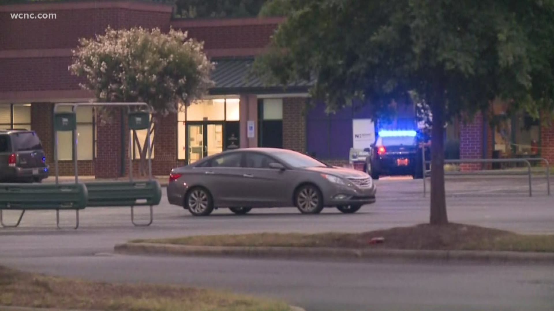 Police in Salisbury shot an armed robbery suspect after he took seven hostages at gunpoint inside a Harris Teeter overnight.