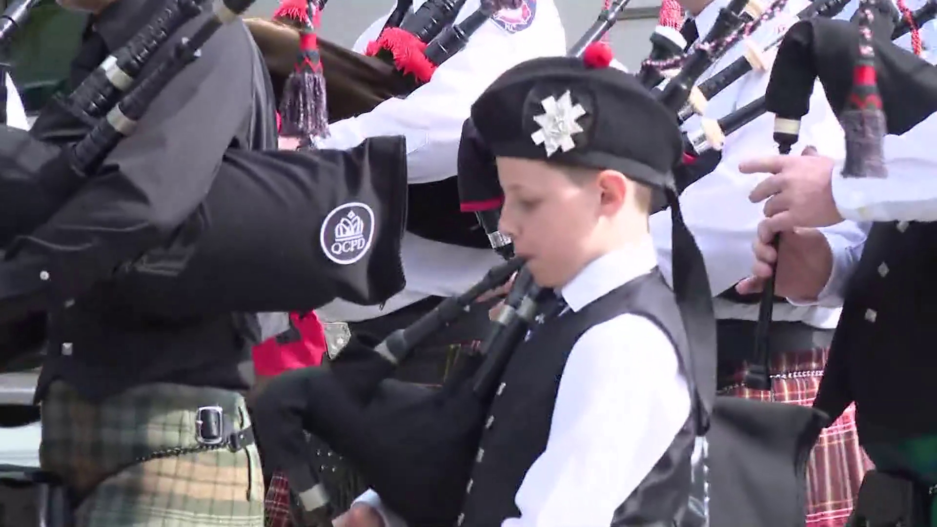 9-year-old plays bagpipes in CMPD officer's procession | wcnc.com