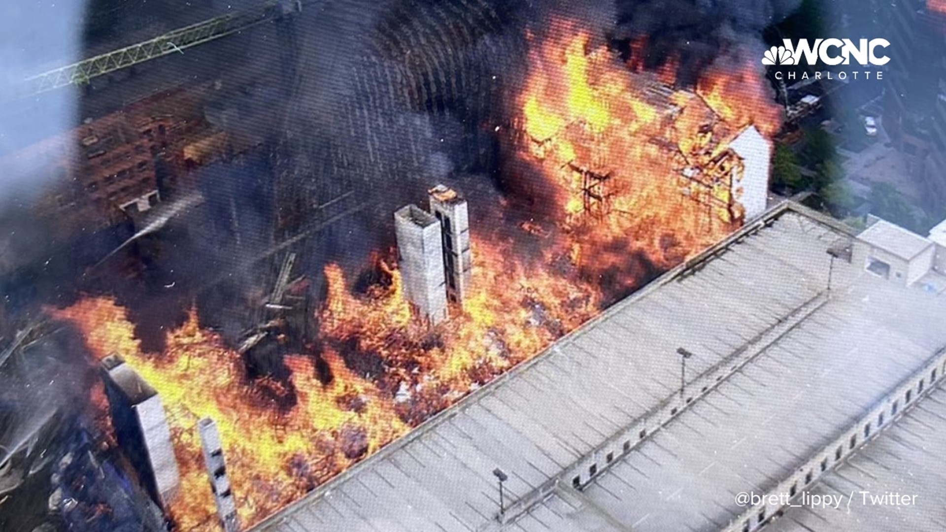 What building in burning in SouthPark in Charlotte, NC?