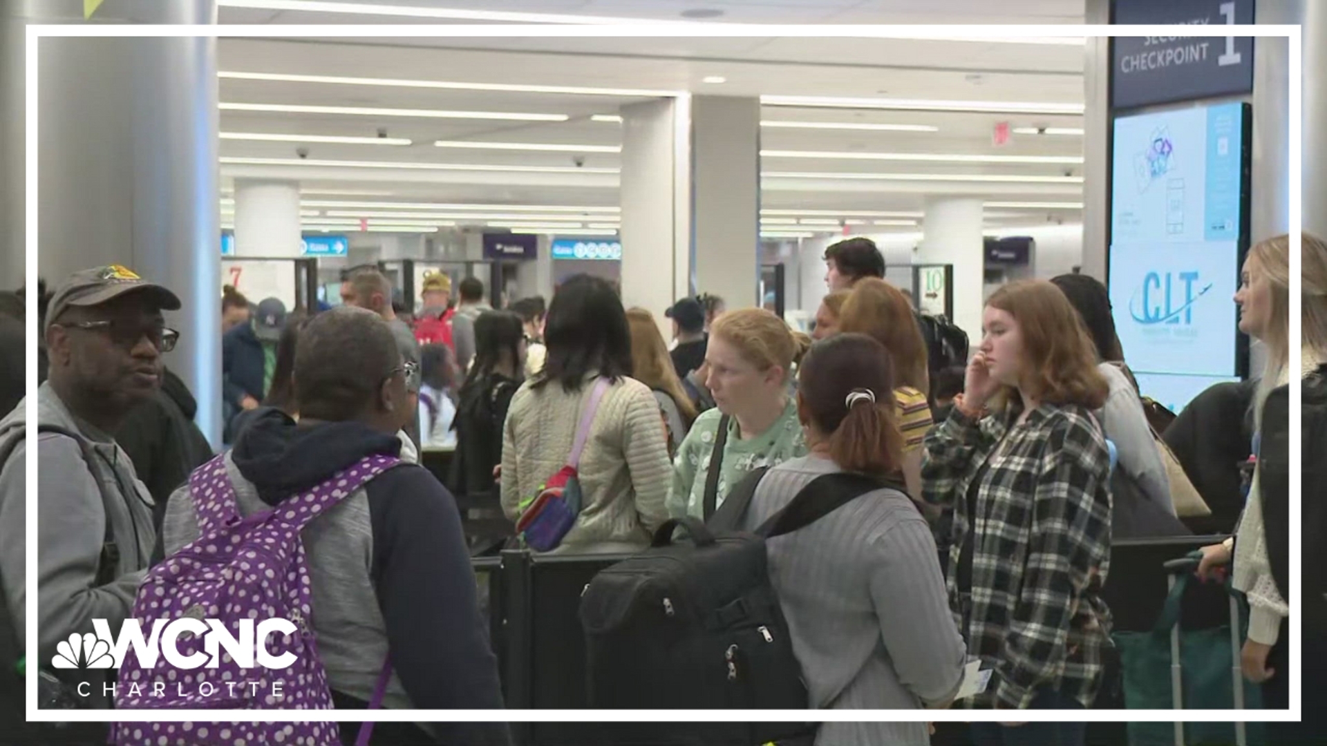 As what could be a record summer travel season starts for Charlotte Douglas International Airport, workers say they've already had enough.