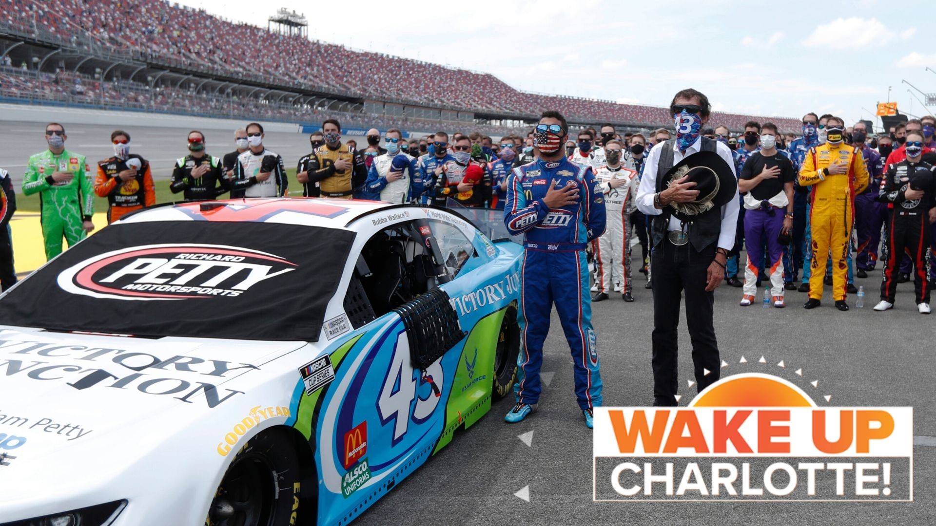 NASCAR driver Bubba Wallace made an emotional return to the track Monday, with all of the drivers rallying behind him after a noose was found in the garage Sunday.