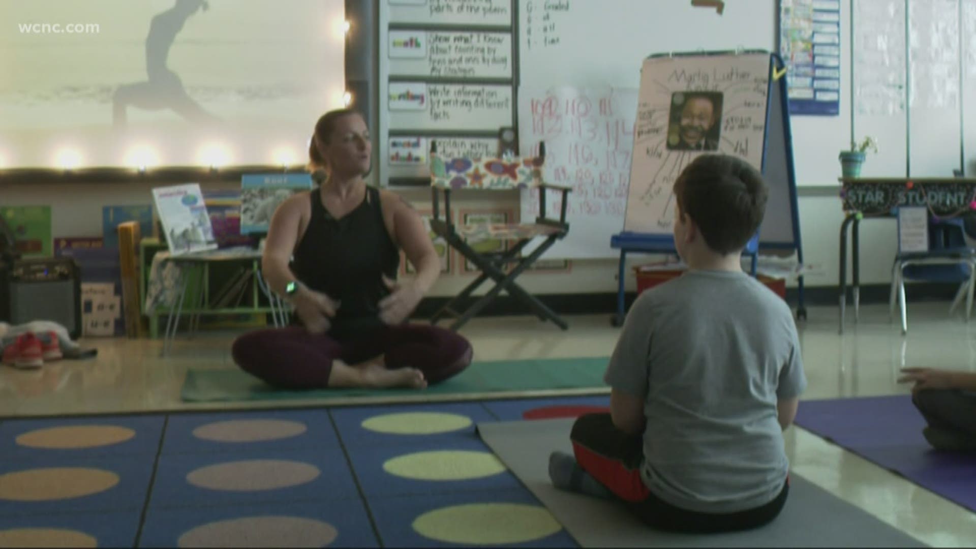 Roughly 20 students and a handful of teachers spend an hour after school every other week to practice yoga to help reduce stress, anger management, increased foucs.