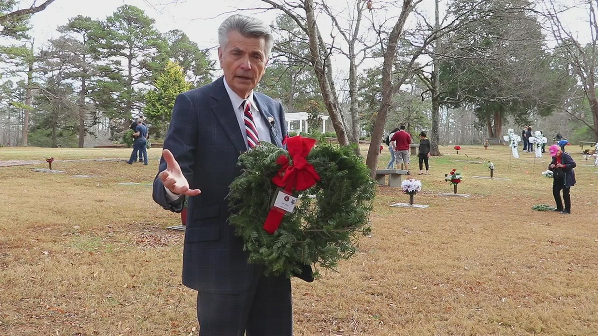 Volunteers spent the day at both locations placing wreaths on the graves of the country's fallen heroes and reading their names aloud.