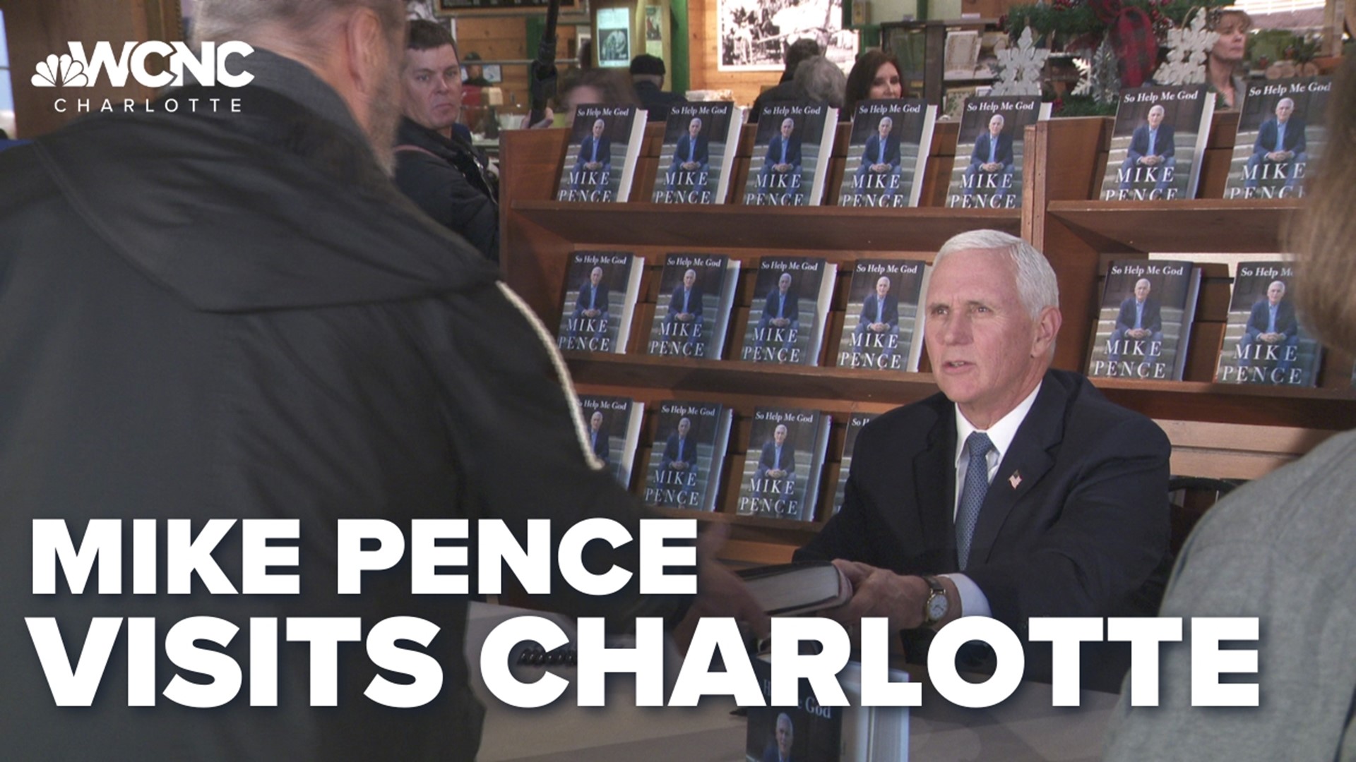 Pence signed copies of his new autobiography "So Help Me God."
