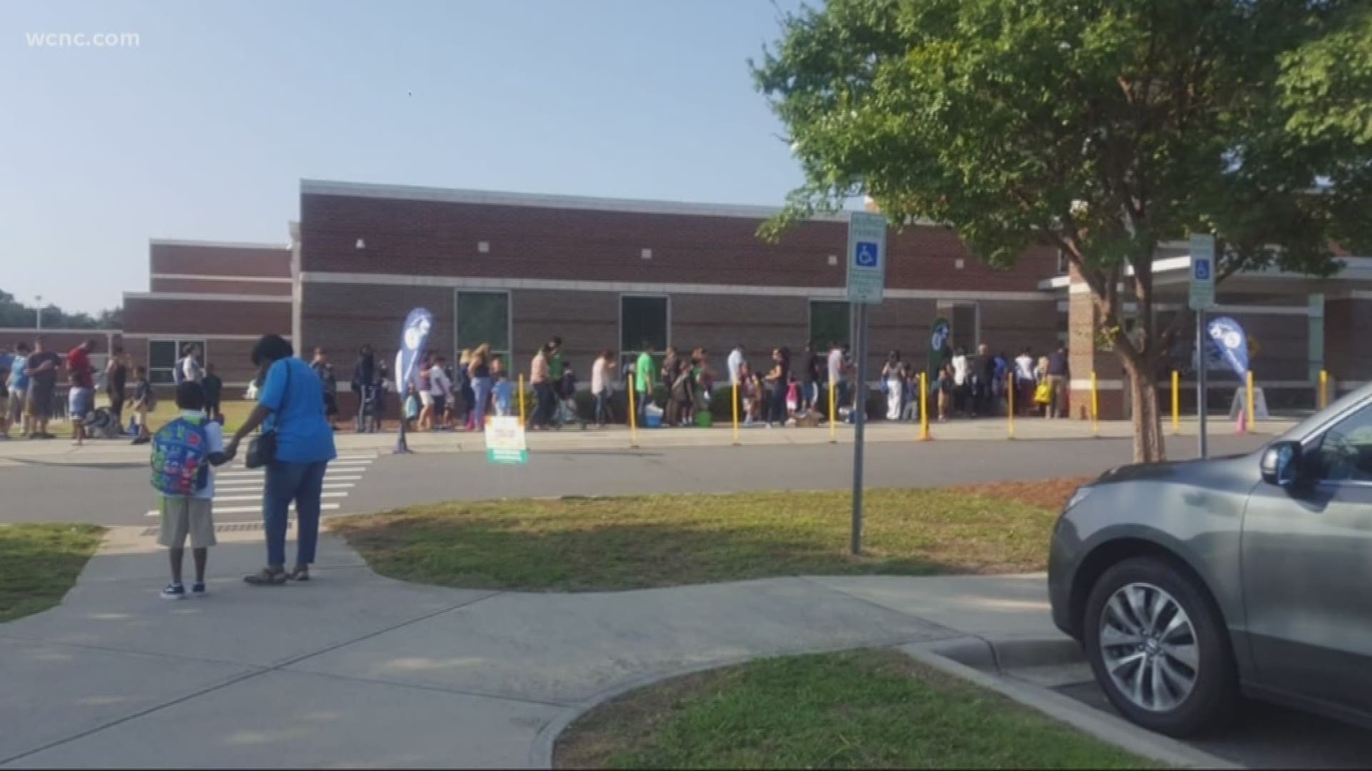 You might remember the first day of school when lines wrapped around school buildings because of the new procedure.