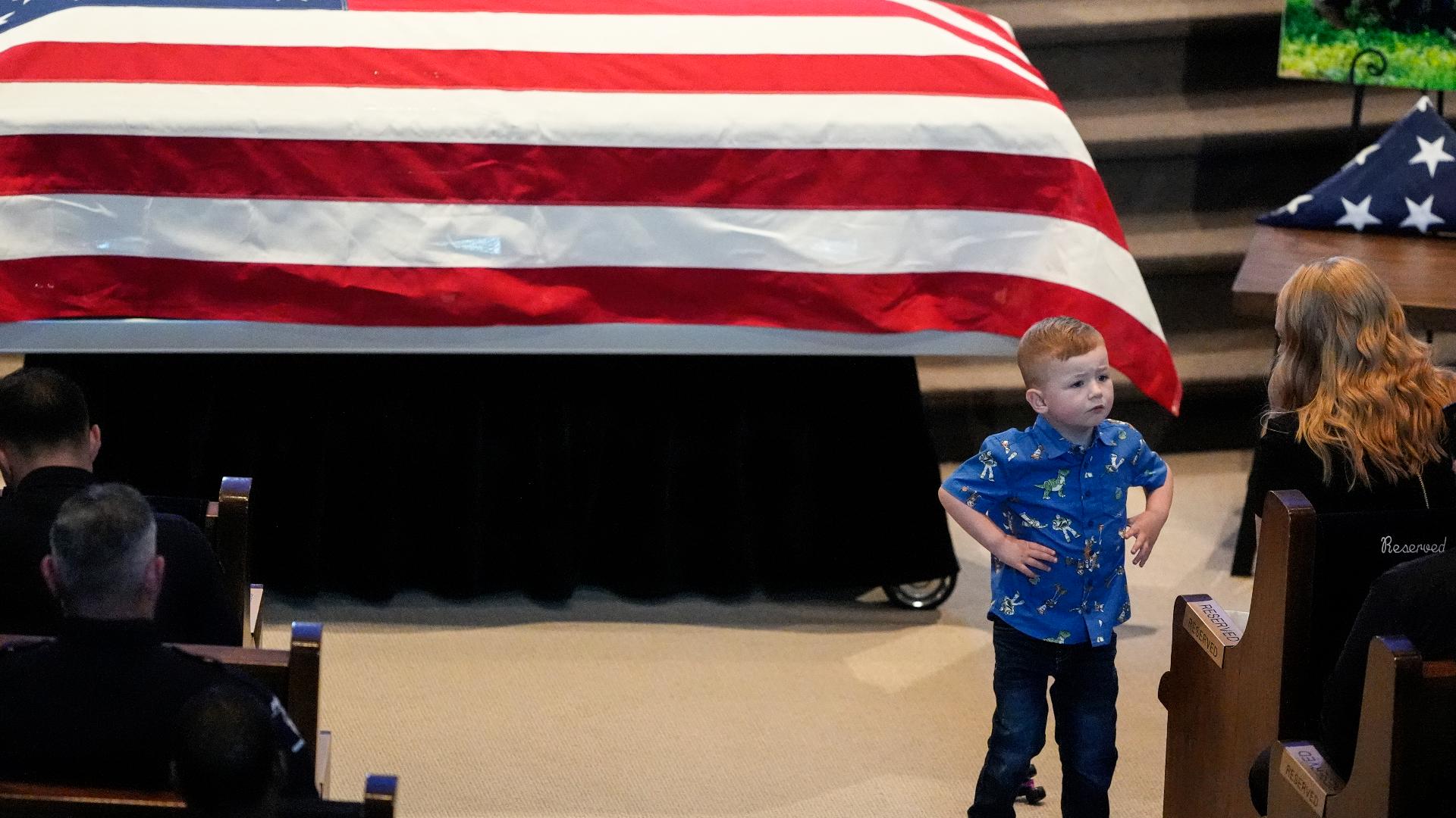 Wife of fallen CMPD officer gives stirring speech at funeral | wcnc.com