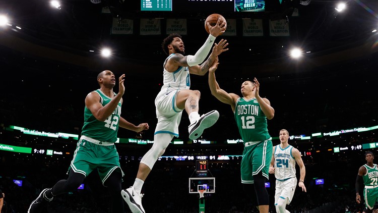 Ball's triple-double carries Hornets past Celtics, 111-102