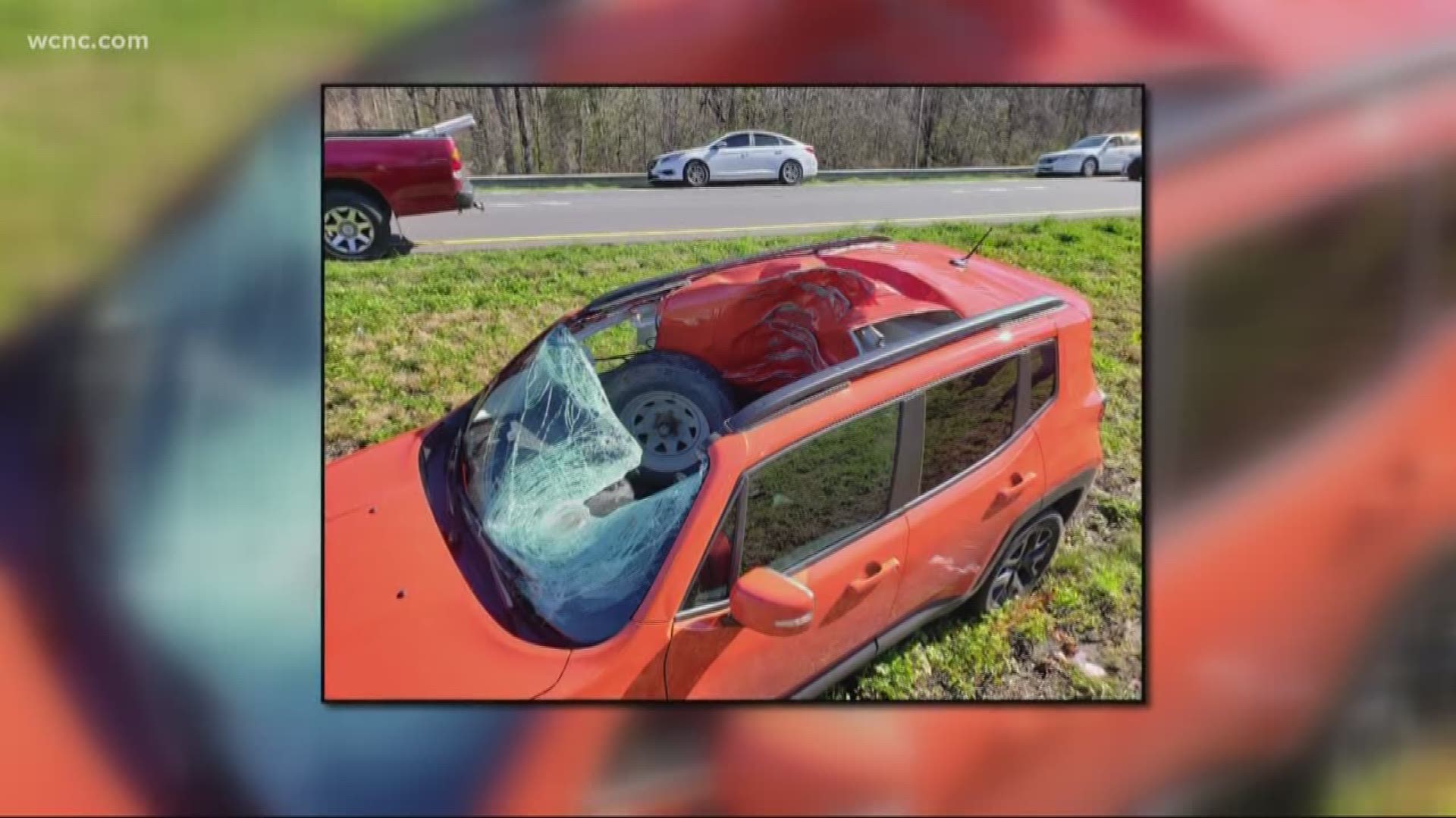 A truck was hauling a large boat when a wheel came loose and rolled across the median. That wheel struck another vehicle, smashing the windshield.