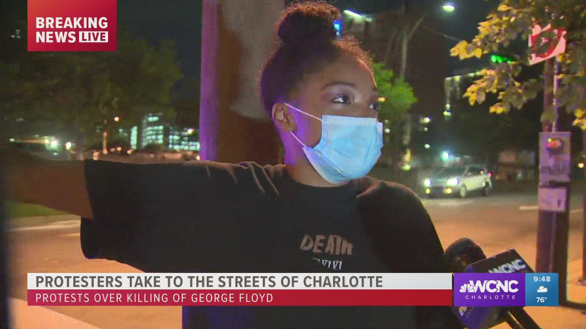 A Kannapolis woman protesting in Charlotte says she is tired people that look like her friends and family being killed.