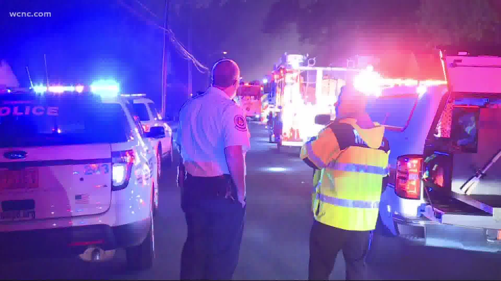One person was taken to the hospital after being rescued from a raging house fire in north Charlotte Wednesday morning.