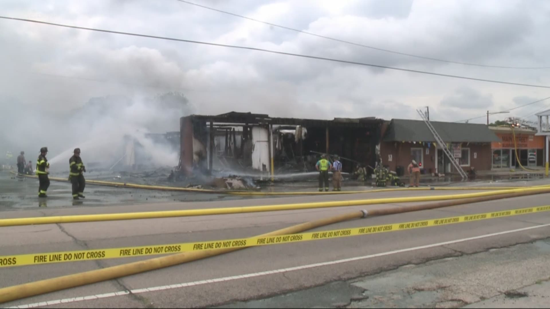 A large building with at least two businesses was badly burned in a fire Thursday morning in downtown Kannapolis.
