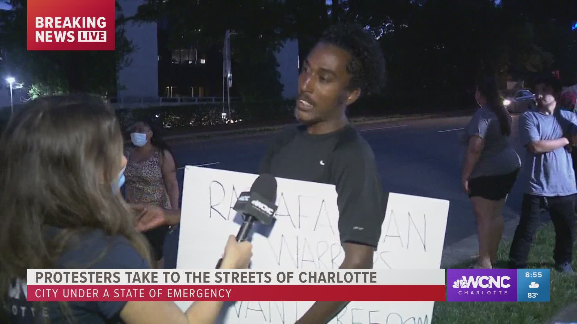 A Jamaican man protesting in uptown Charlotte told WCNC Charlotte he feels everyone needs to come together as one.