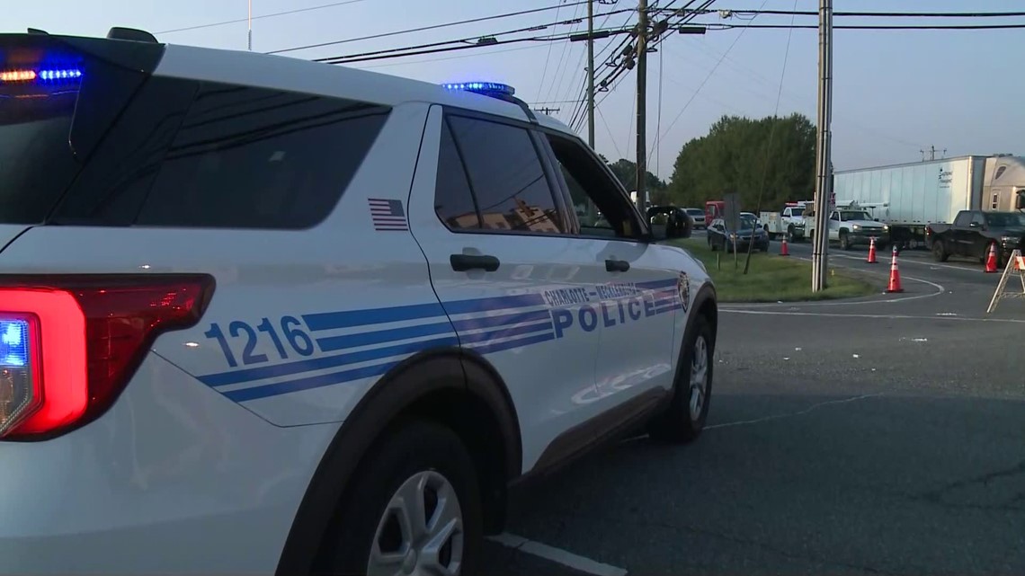 Dump truck takes out power lines, causes traffic issues | wcnc.com