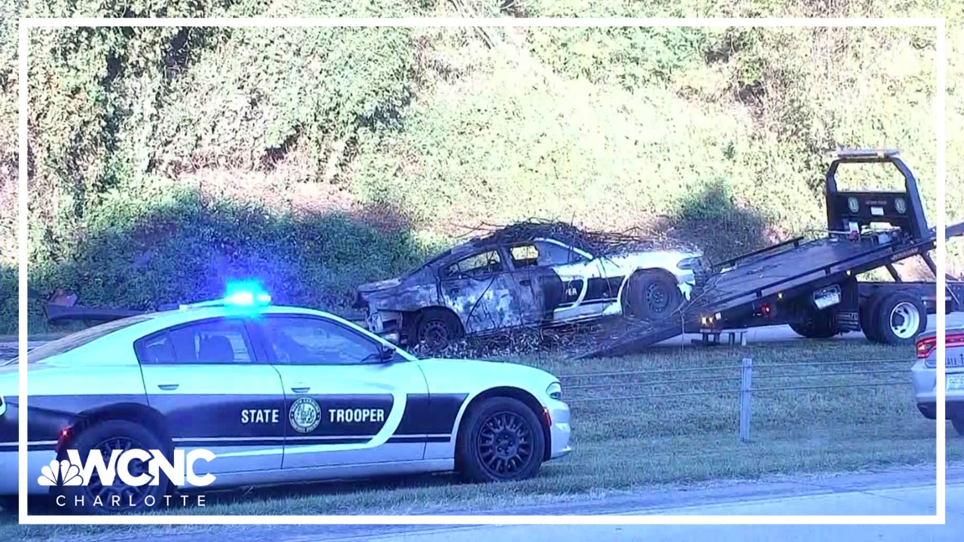 A WCNC Charlotte crew at the scene on Billy Graham Parkway saw the moments the vehicle was revealed under the branches.