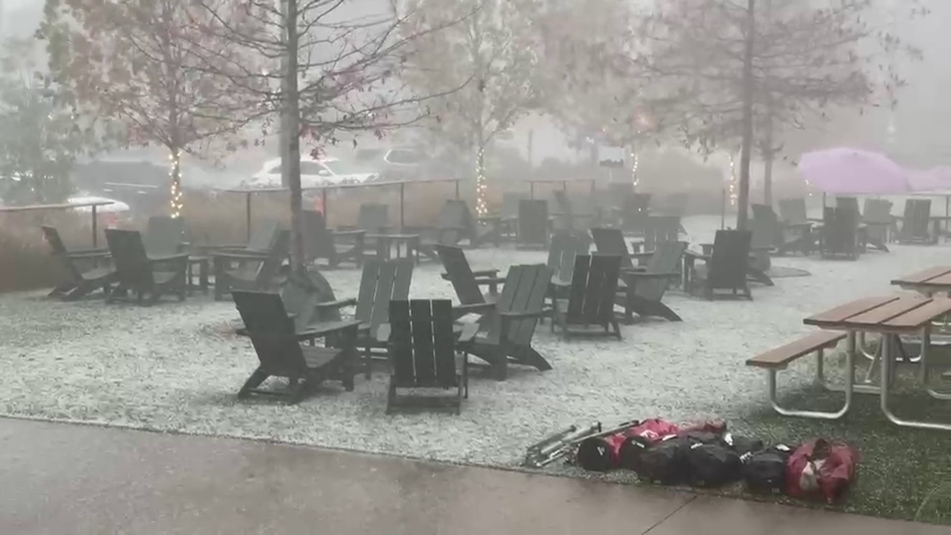 Small hail and heavy rain fell at Optimist Hall in Charlotte, North Carolina Wednesday. Video by Grant Baldwin.