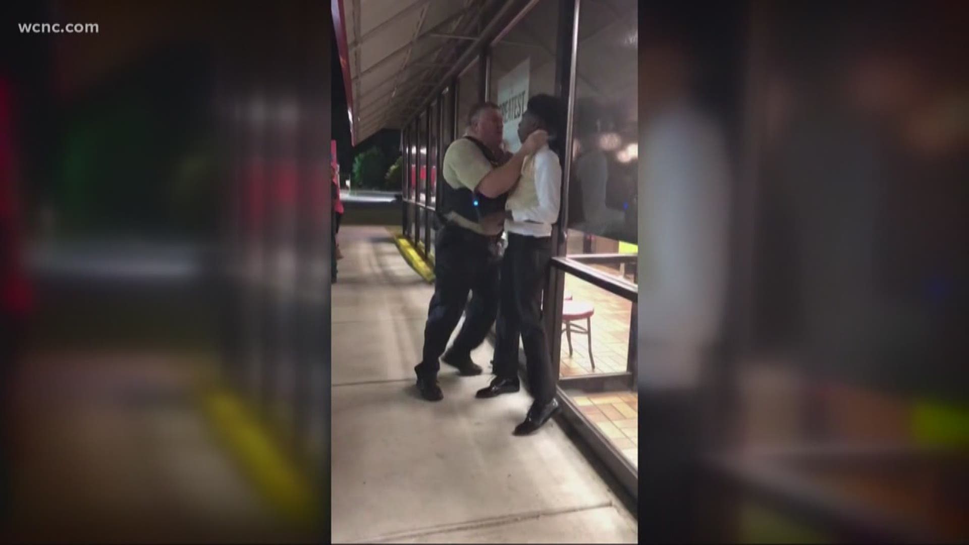 New video shows police officer choking man