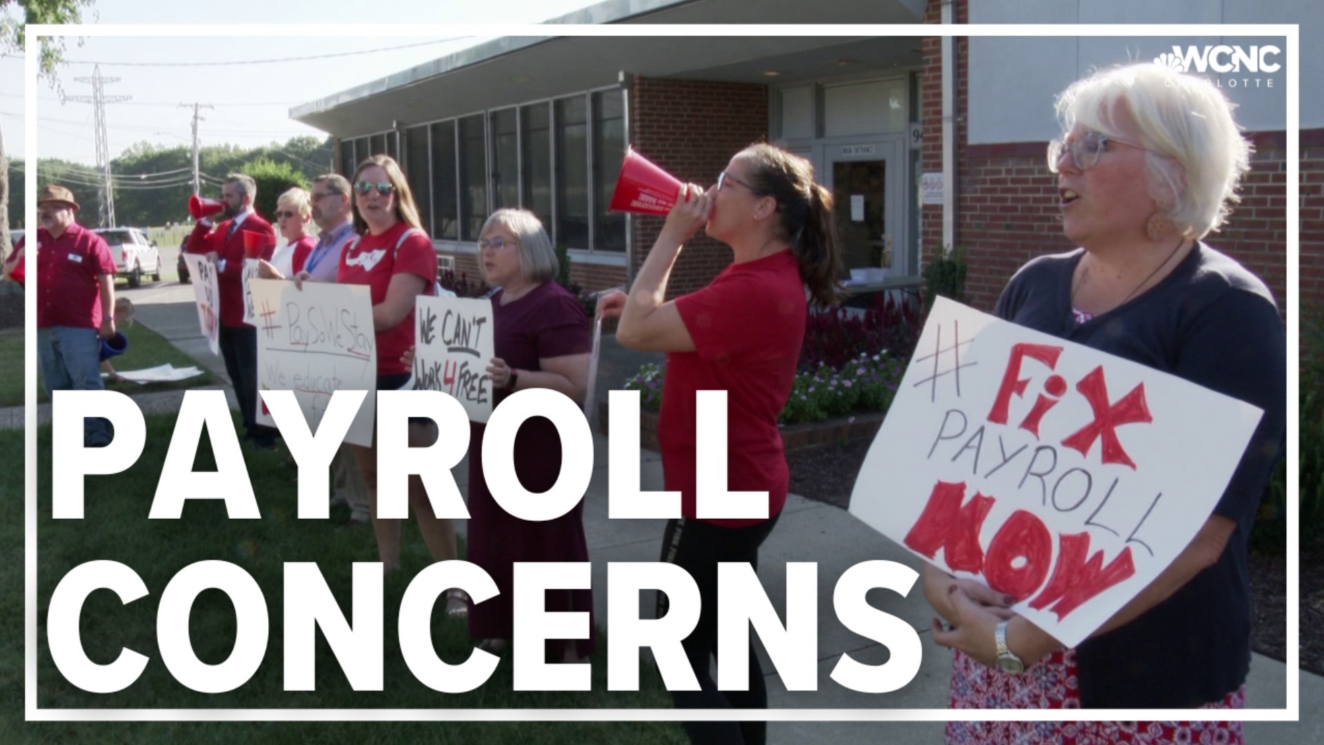 School employees have been protesting payroll issues since the county adopted a new payroll system in January.