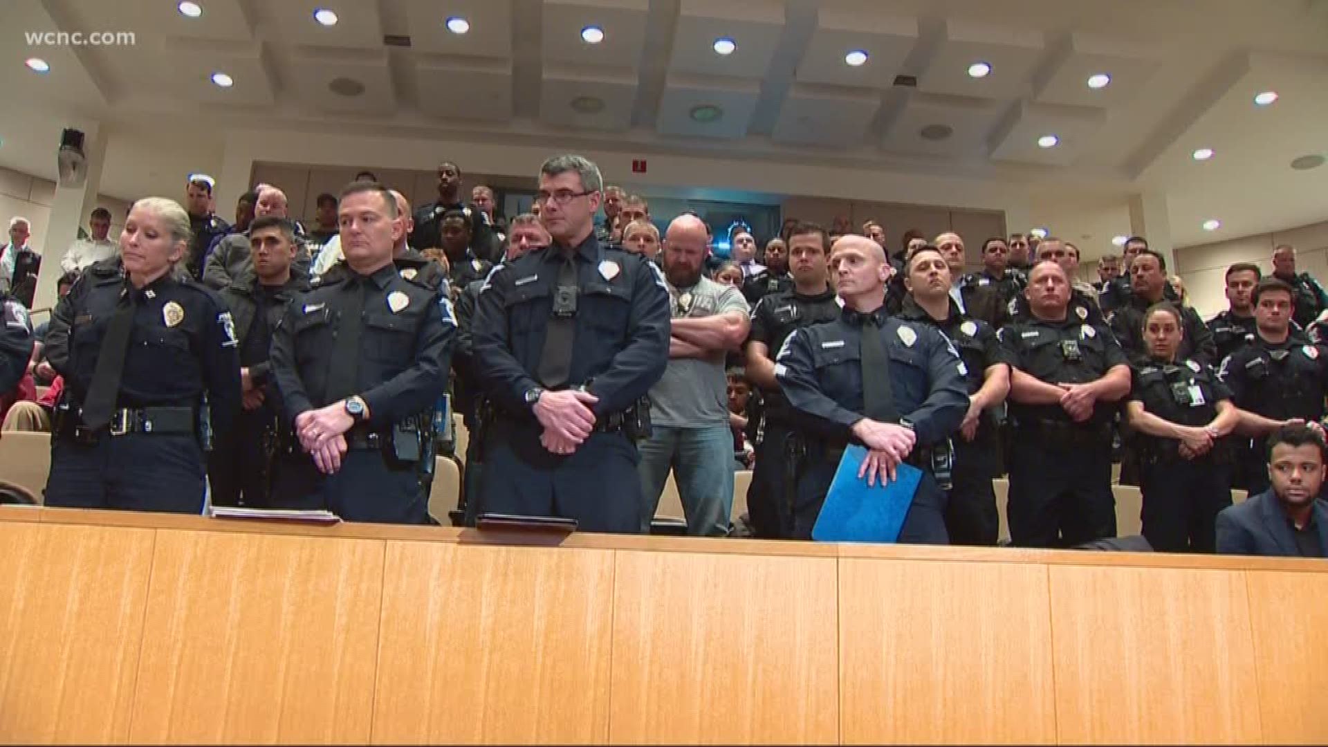 CMPD officers fill council meeting over pay