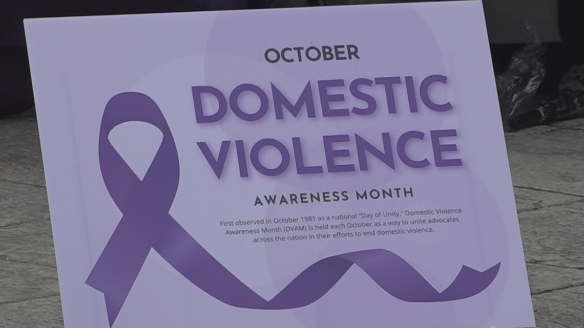 Survivors walk for Domestic Violence Awareness Month in Mecklenburg ...