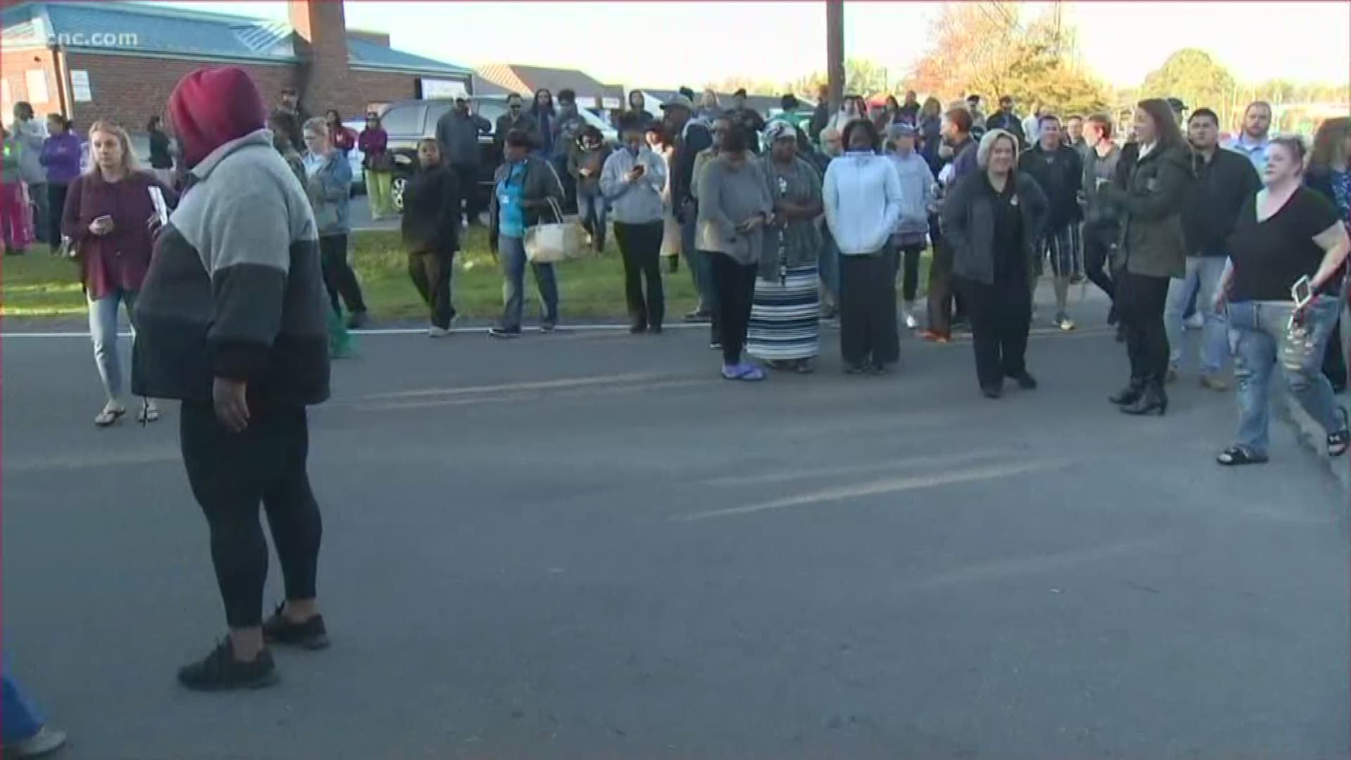 Emotions ran high at Butler High School in Matthews Monday due to confusion as to how parents could pick up their students after a shooting at the school.