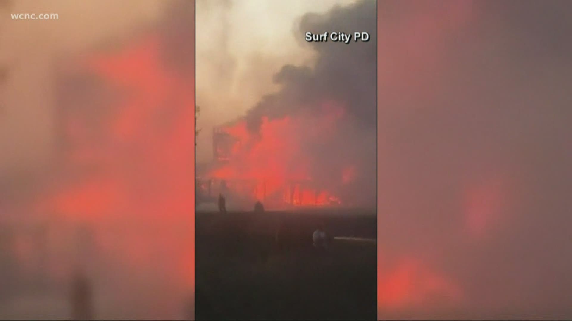 A huge plume of smoke was visible for miles and video from the scene showed heavy flames consuming one of the buildings.