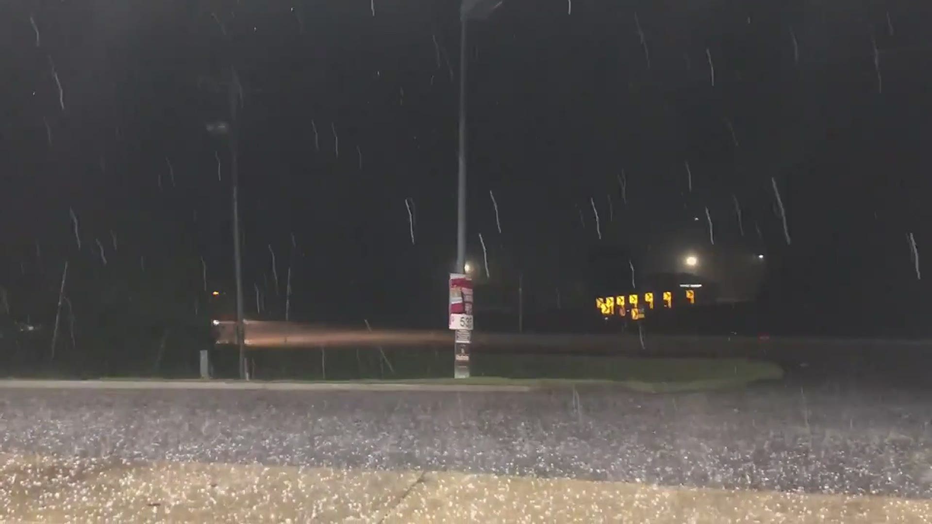 Hail falls in Grover in Cleveland County, North Carolina as severe weather rolled through Saturday evening.